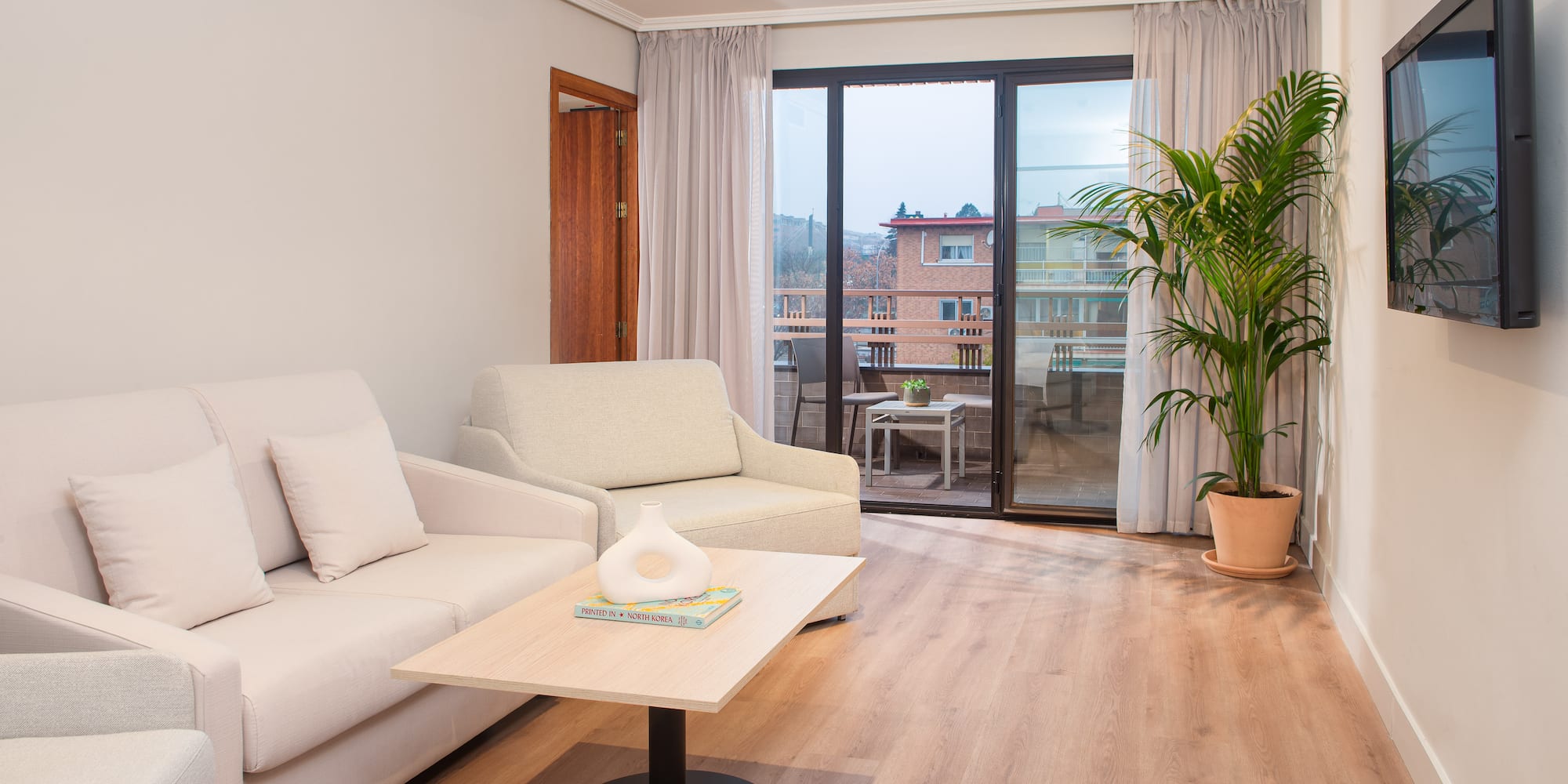 a living room with a couch and a table