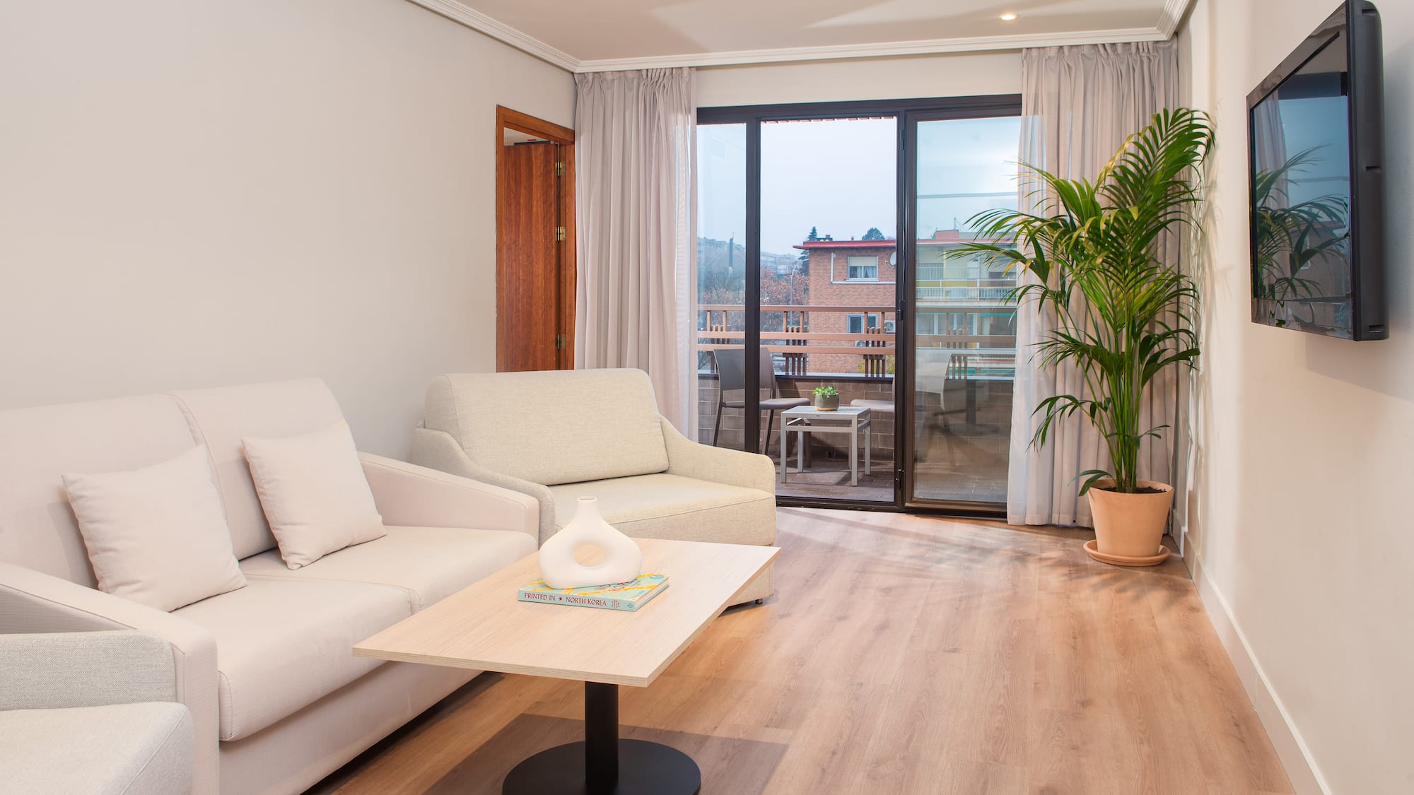 a living room with a couch and a table