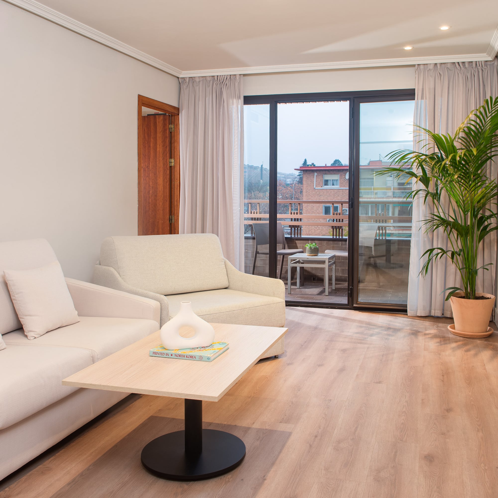 a living room with a couch and a table