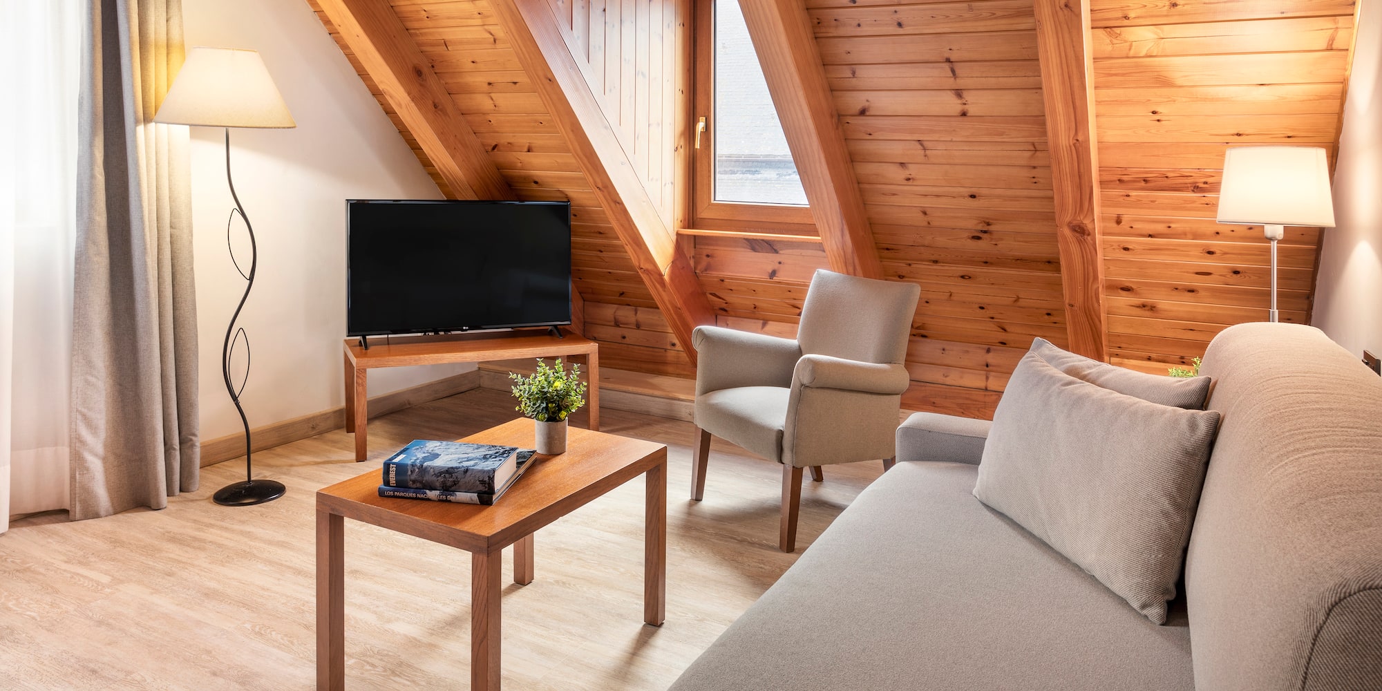 a living room with a tv and a couch