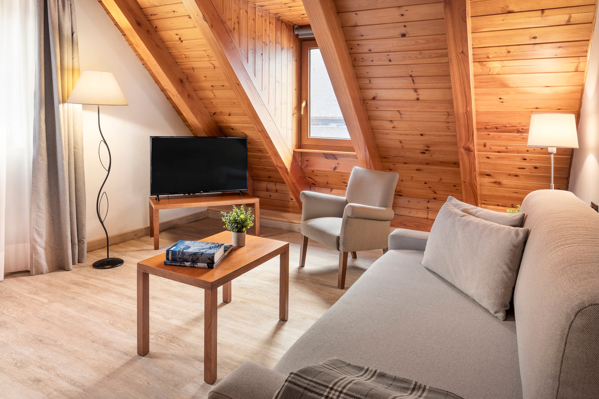 a living room with a tv and a couch