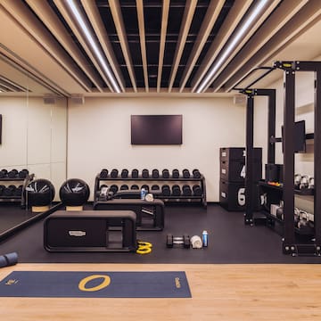 a gym with weights and equipment