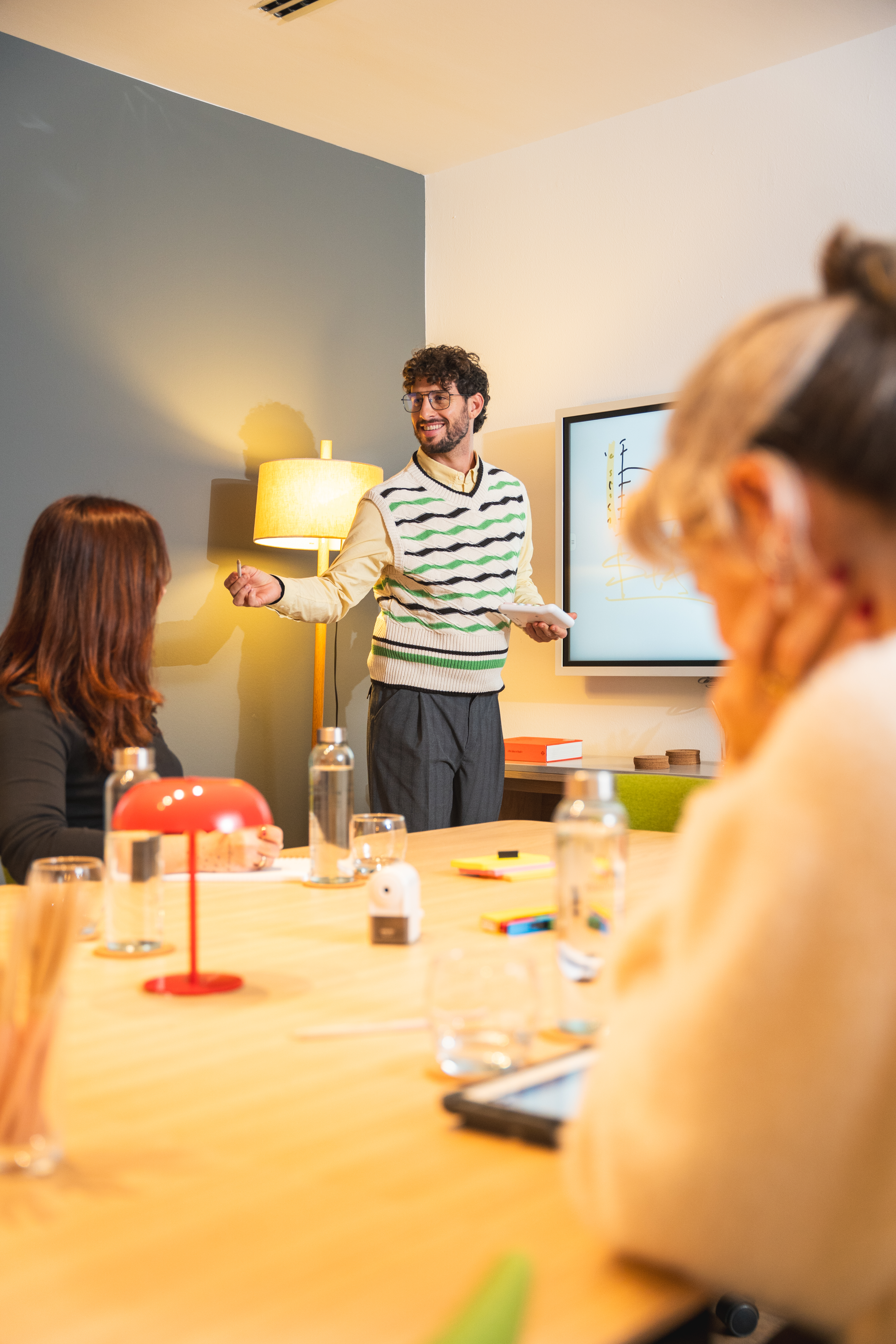 a man standing in front of a group of people