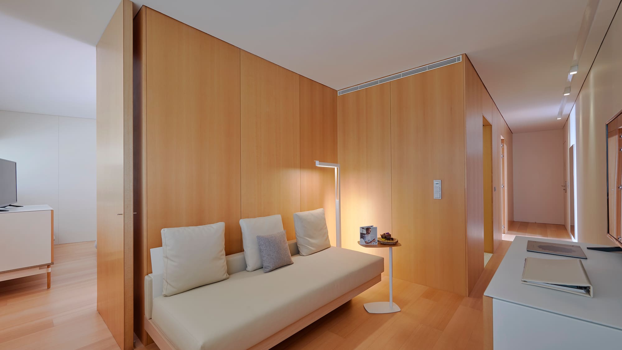 a room with a couch and a table