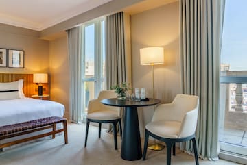 a room with a table and chairs