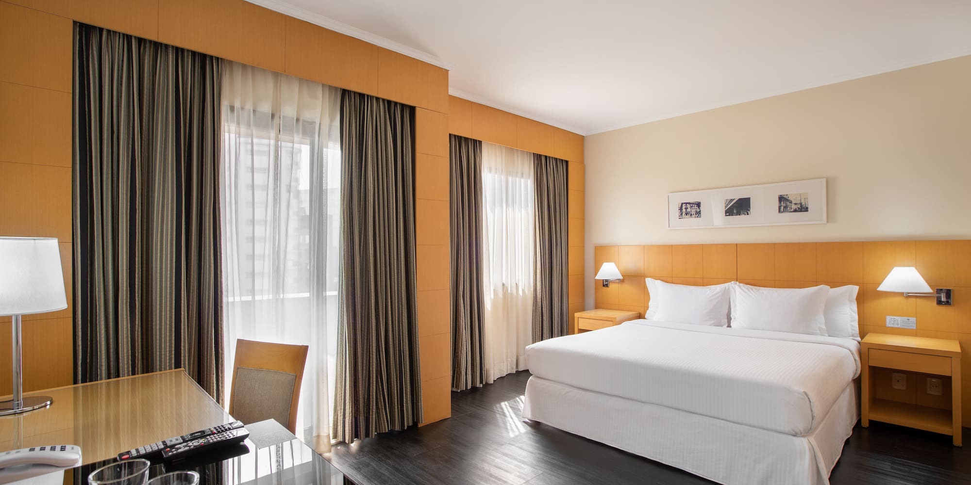 a room with a bed and a desk