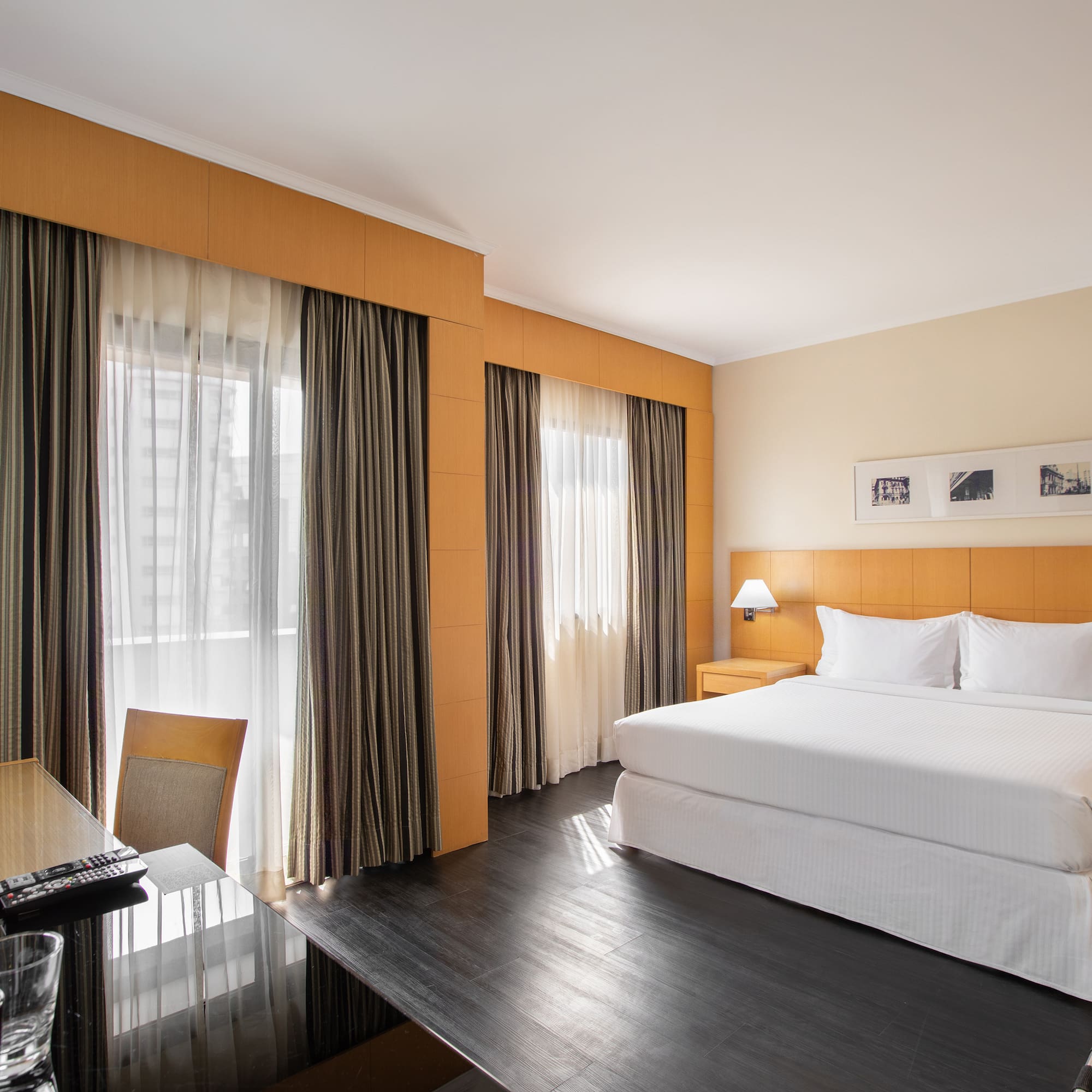 a room with a bed and a desk