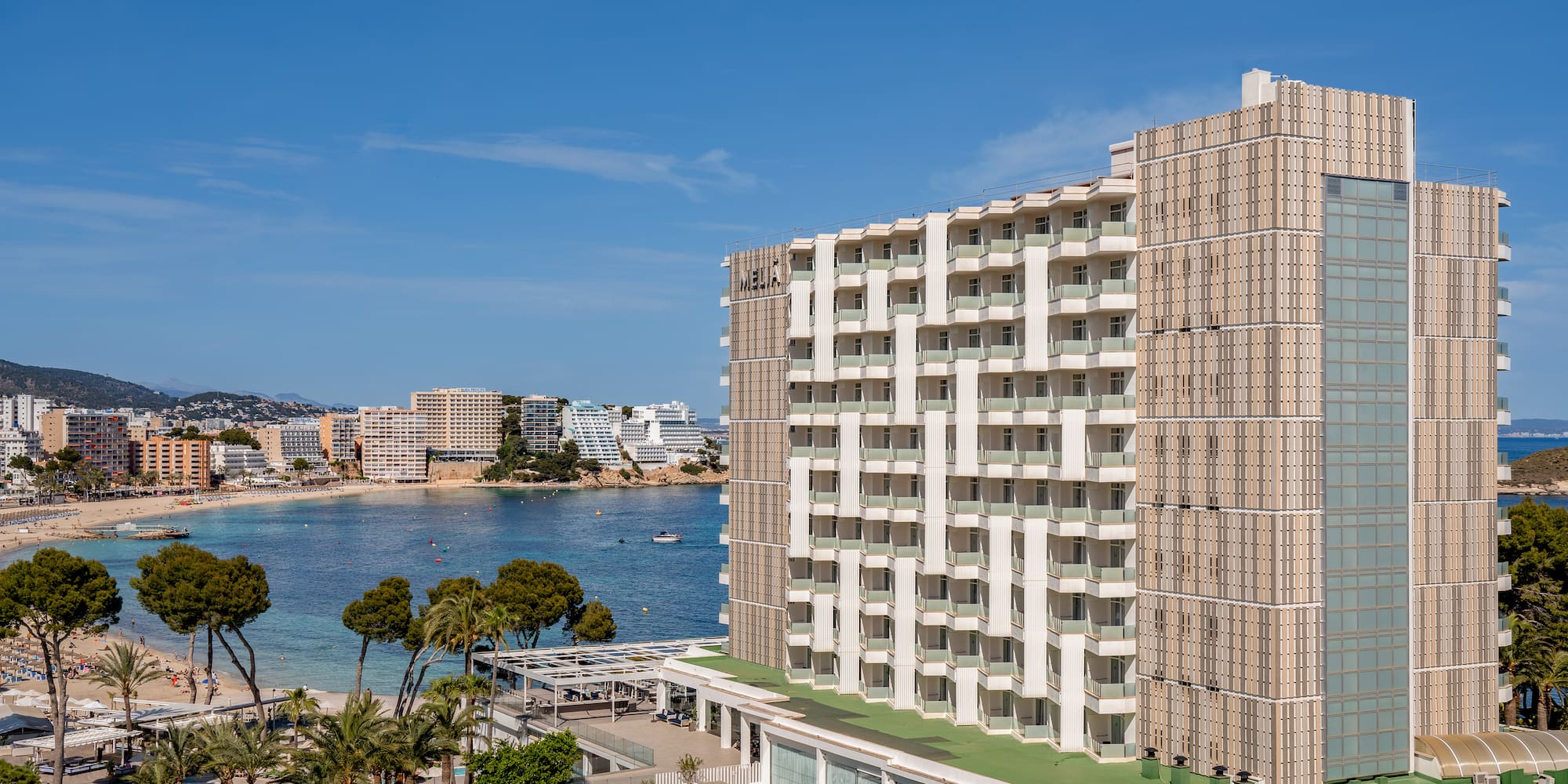 a building next to a body of water