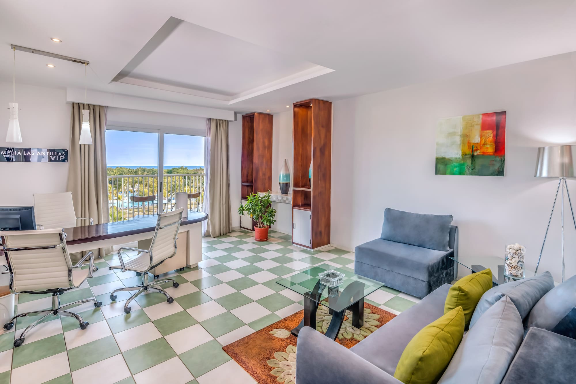 a room with a couch and a desk