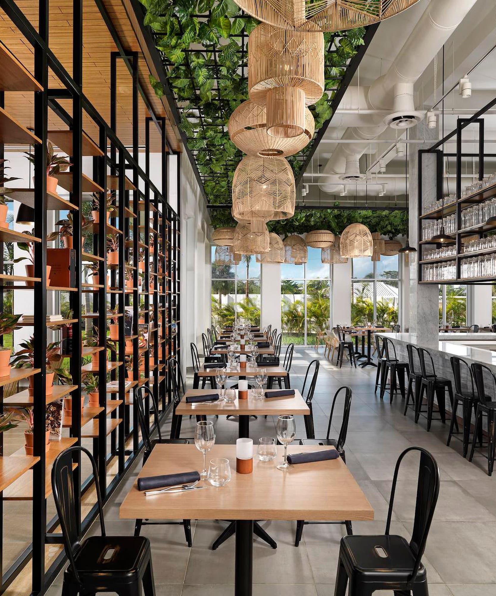 a restaurant with tables and chairs