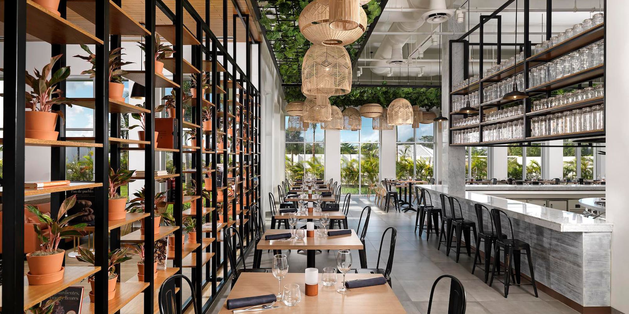 a restaurant with tables and chairs