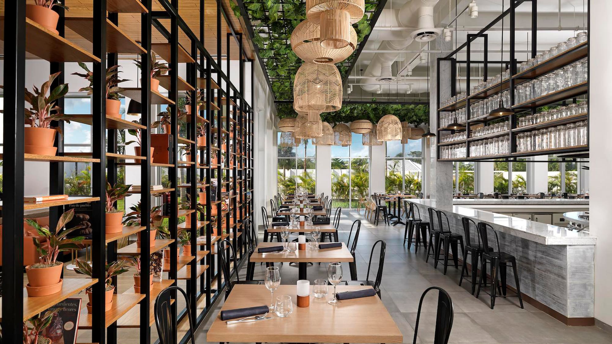 a restaurant with tables and chairs