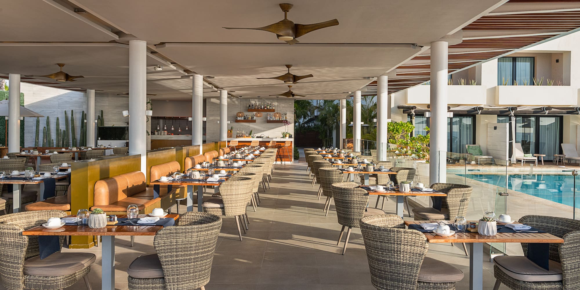 a restaurant with tables and chairs