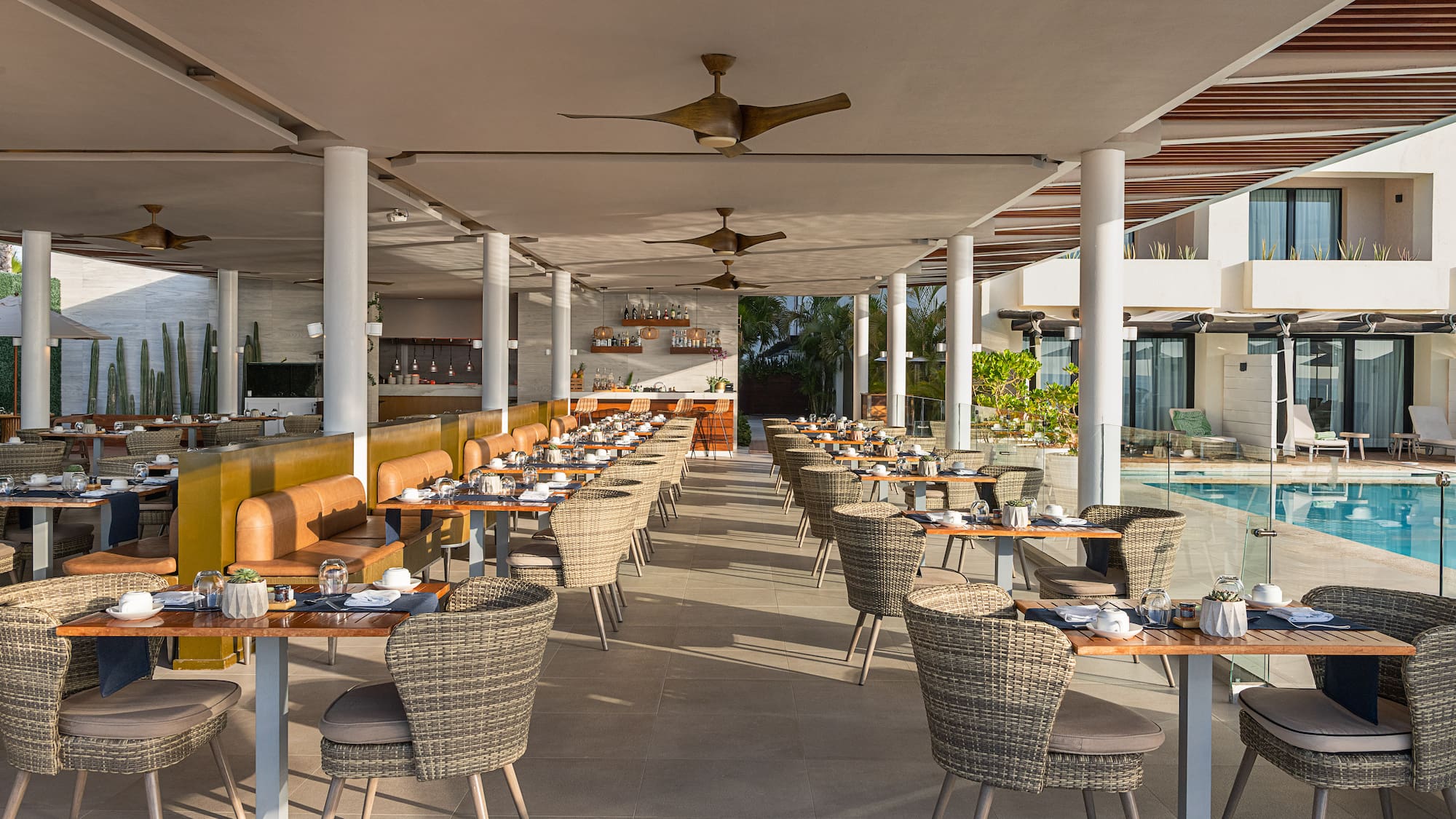 a restaurant with tables and chairs