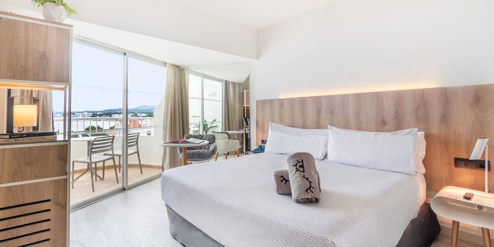 a bed with a glass door