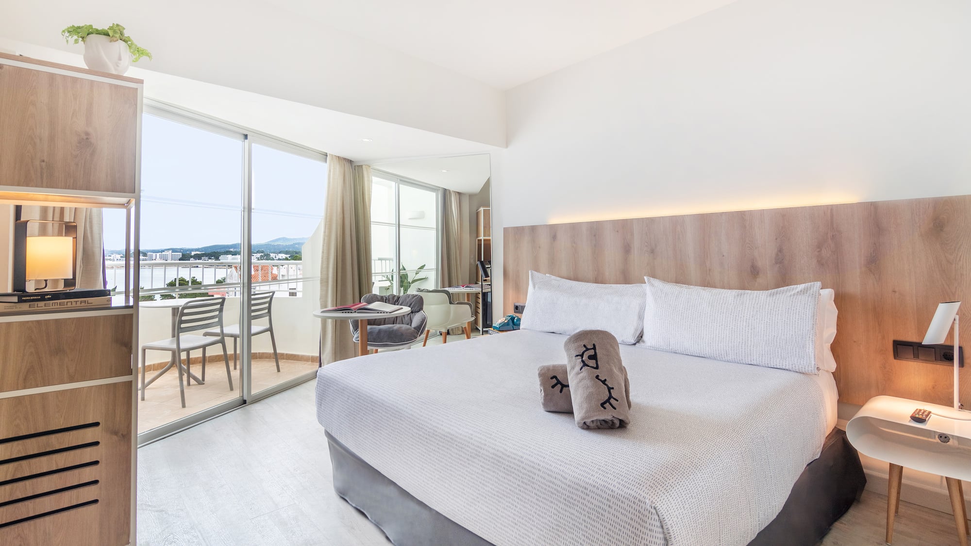 a bed with a glass door