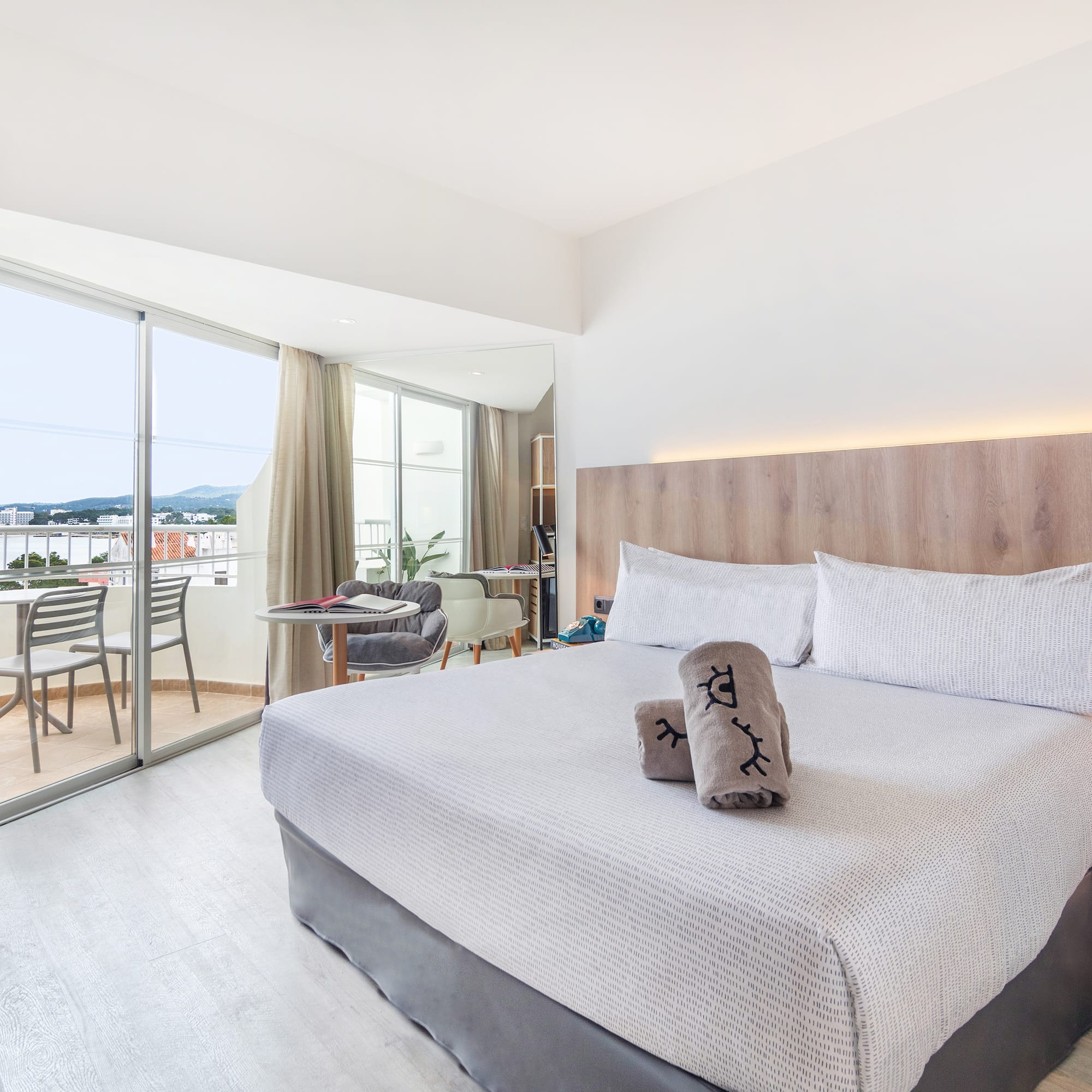 a bed with a glass door