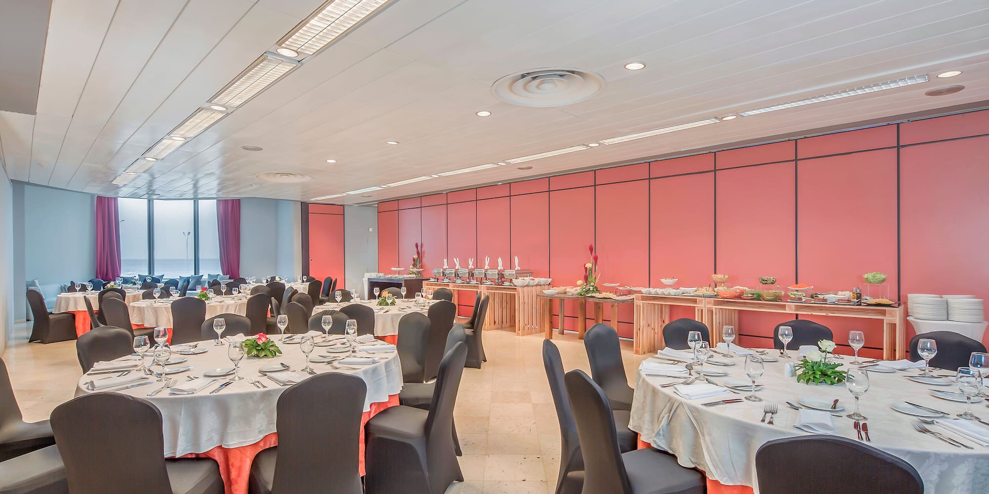 a room with tables and chairs