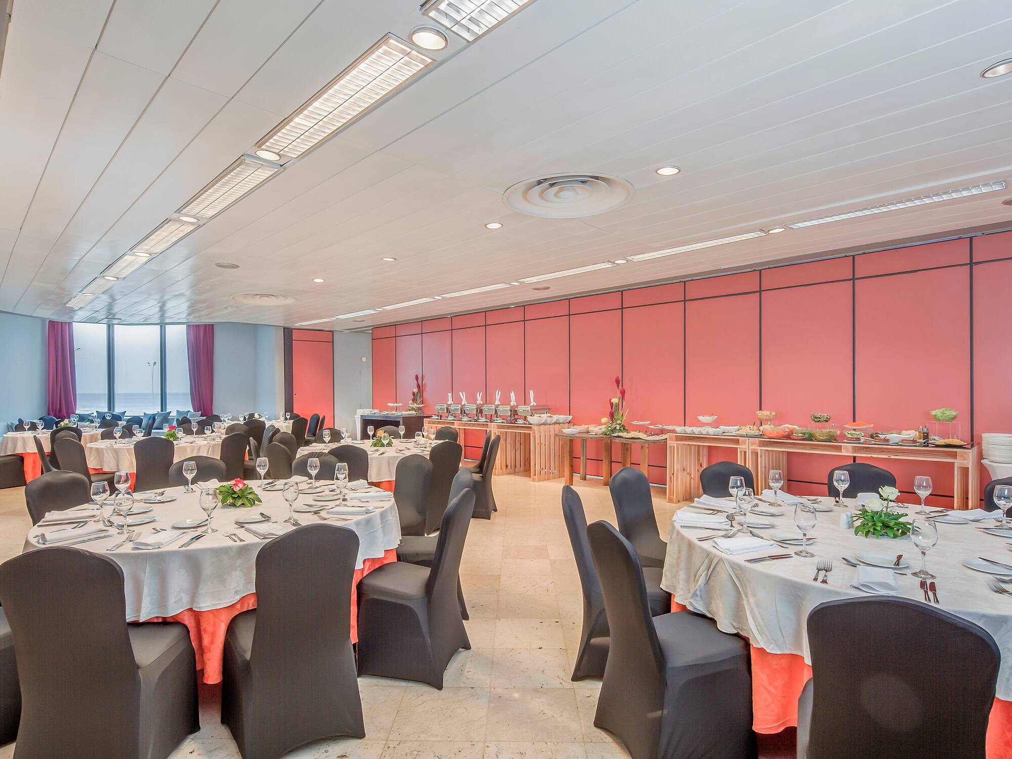 a room with tables and chairs