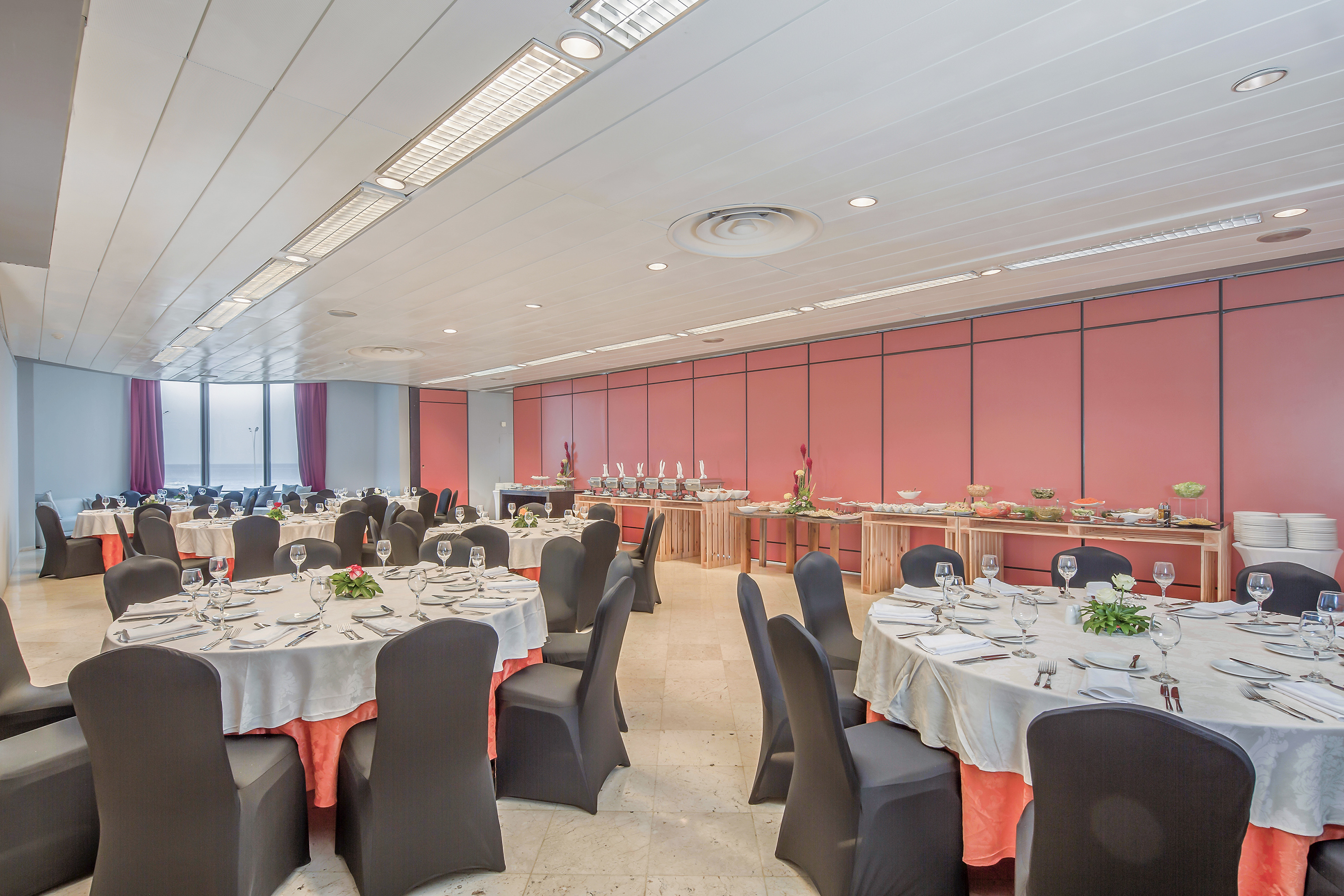 a room with tables and chairs