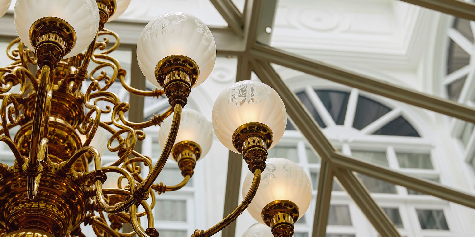 a chandelier with white globes