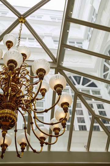 a chandelier with white globes