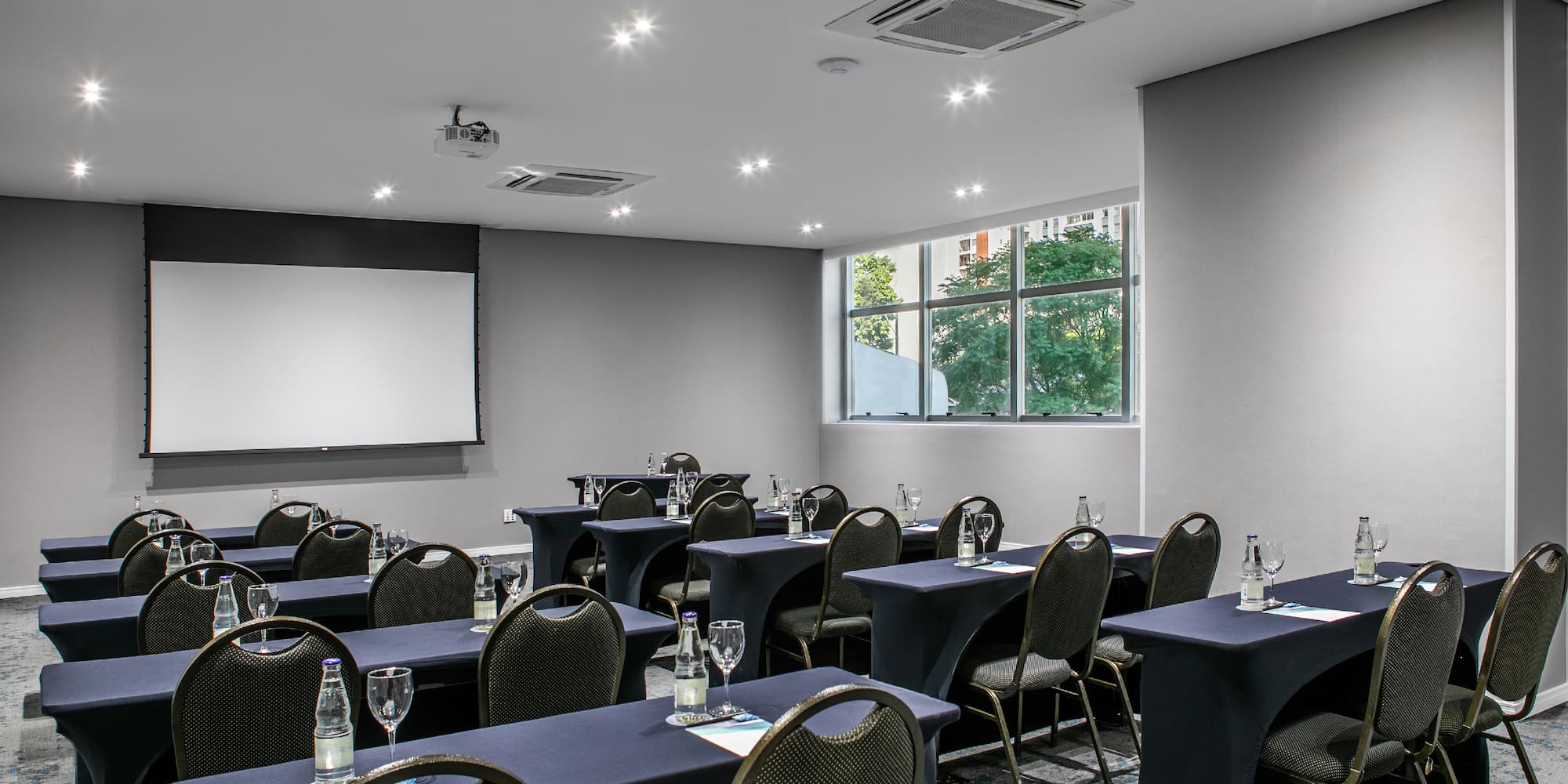 a room with tables and chairs