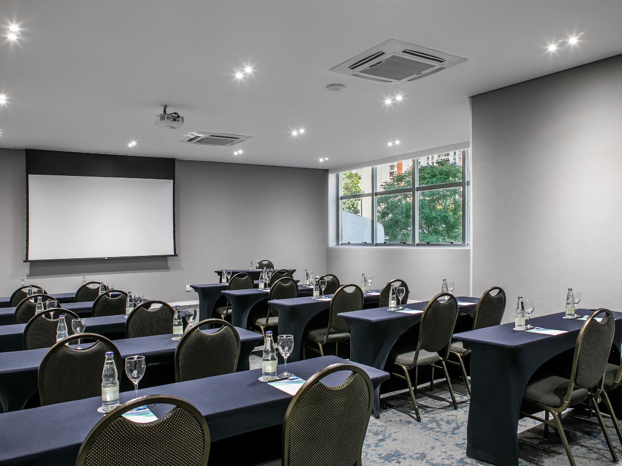 a room with tables and chairs