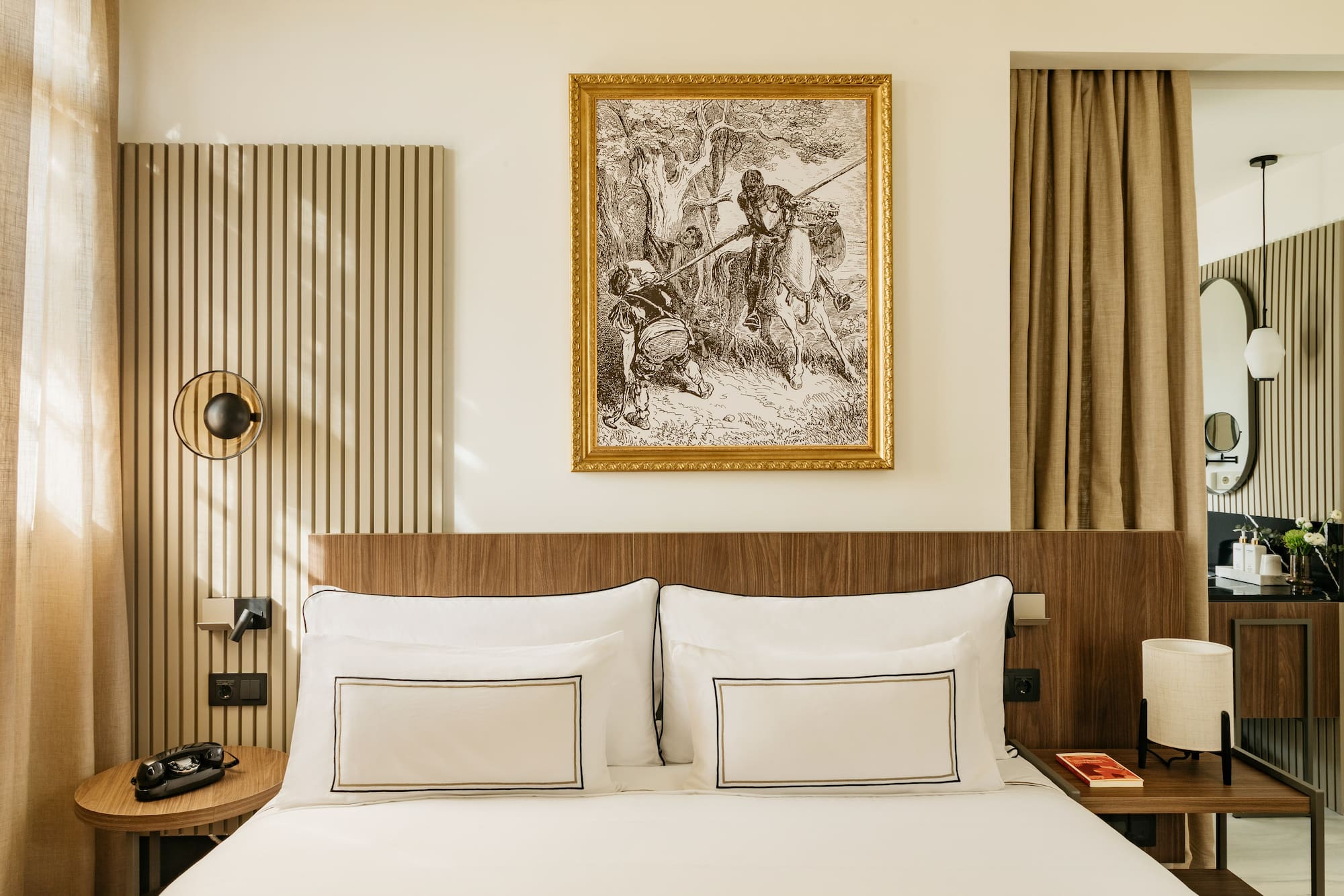 a bedroom with a bed and a chair