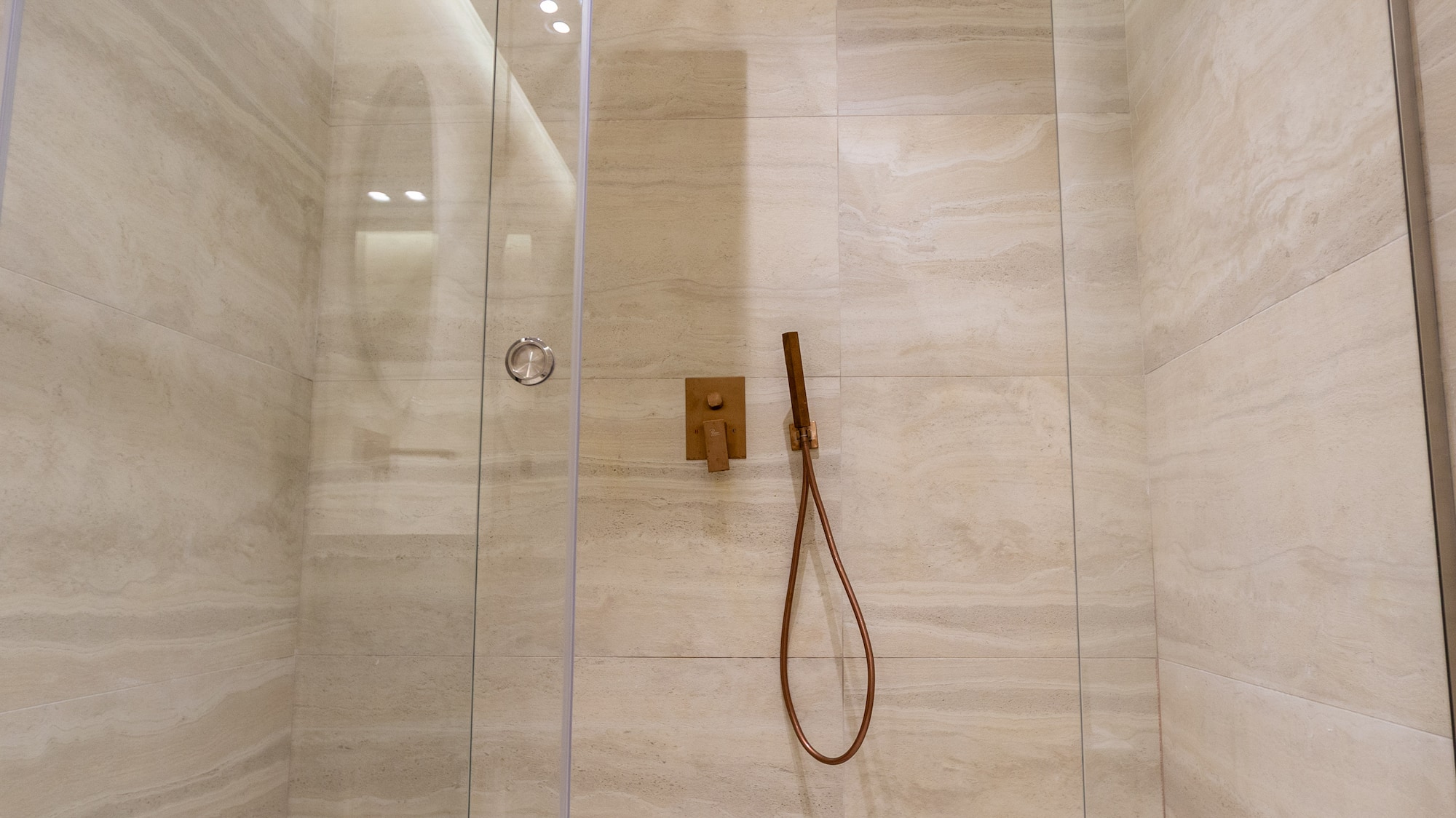 a shower with a glass door