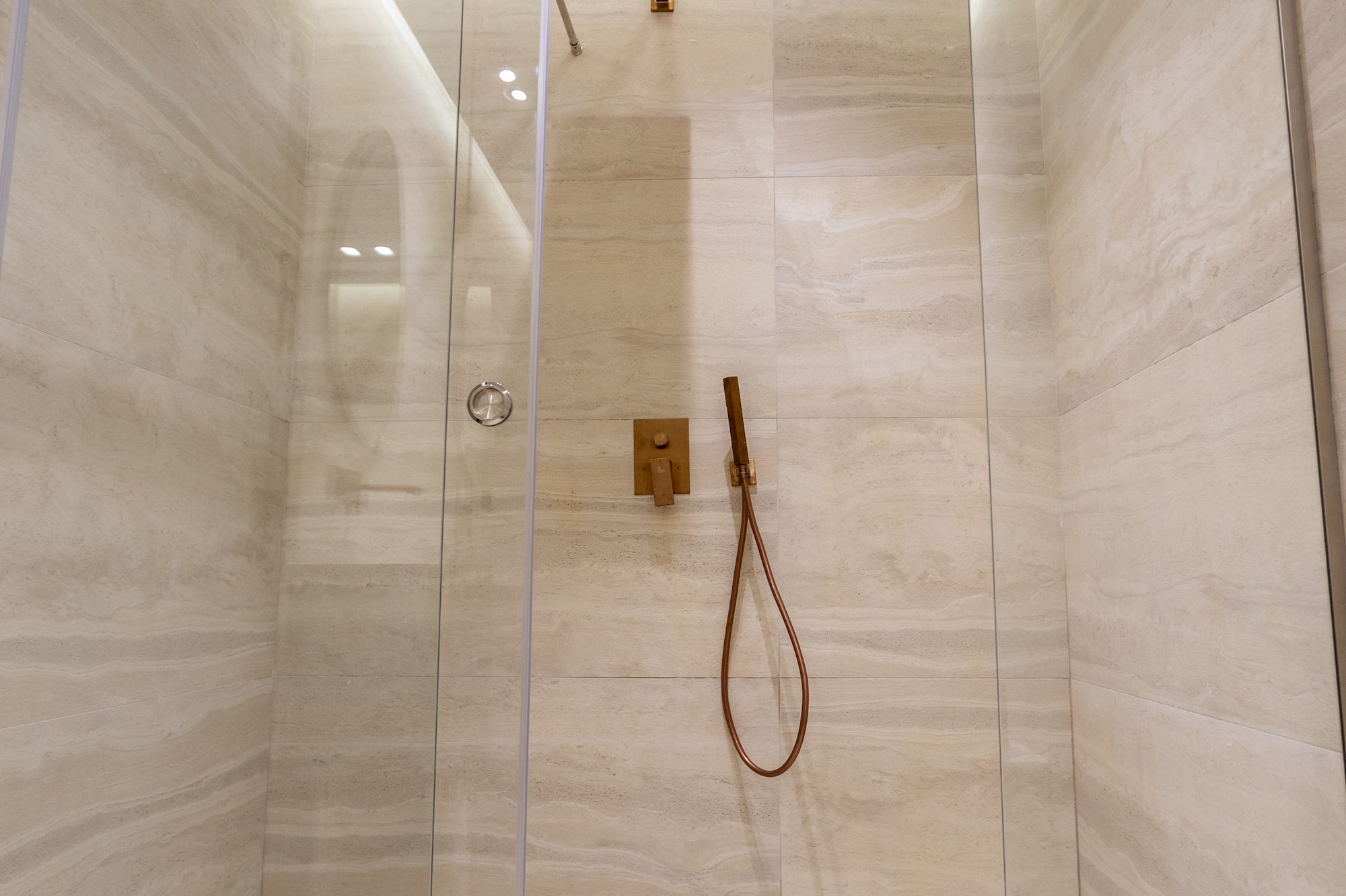 a shower with a glass door