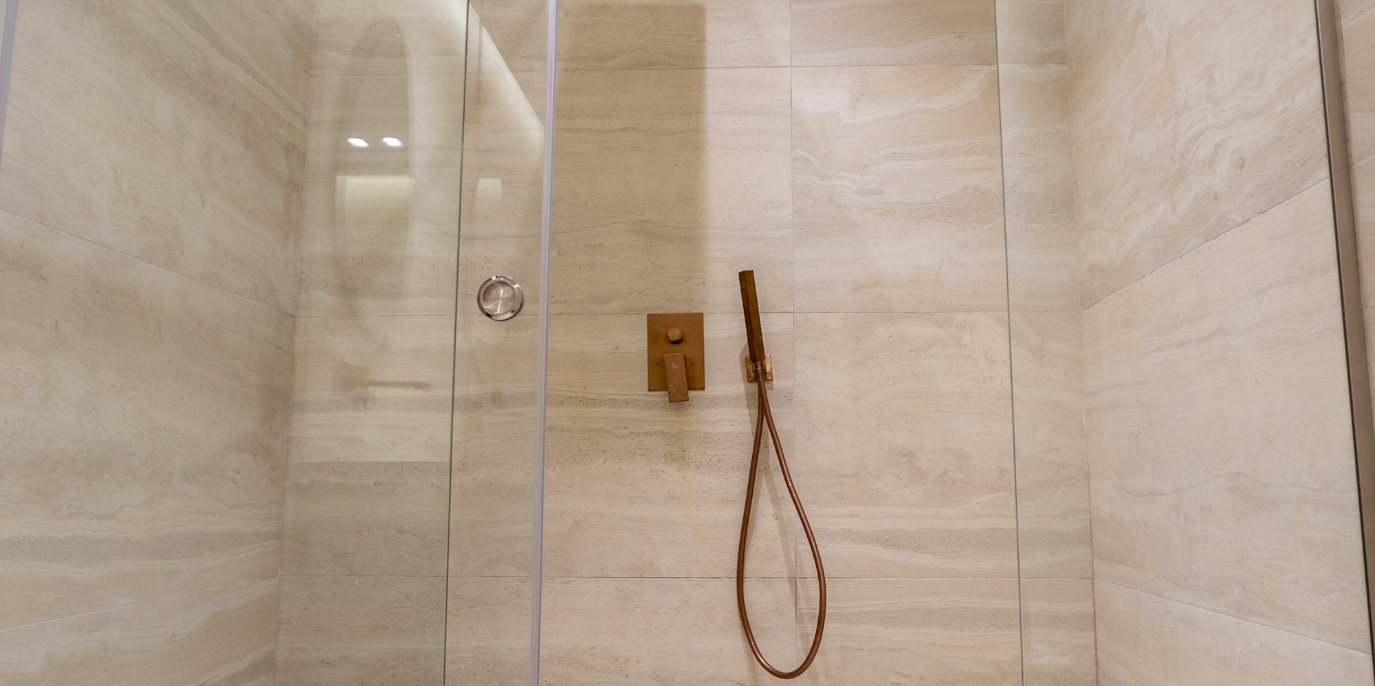 a shower with a glass door