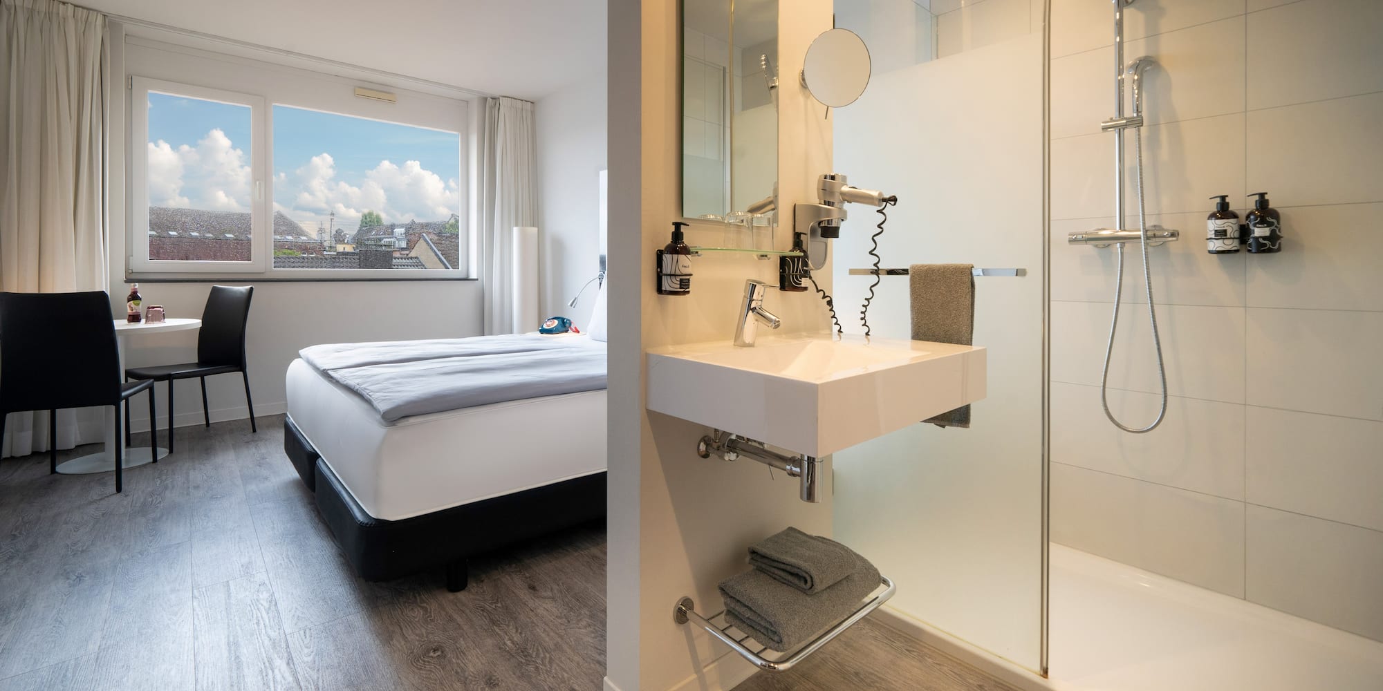 a bathroom with a shower and a bed