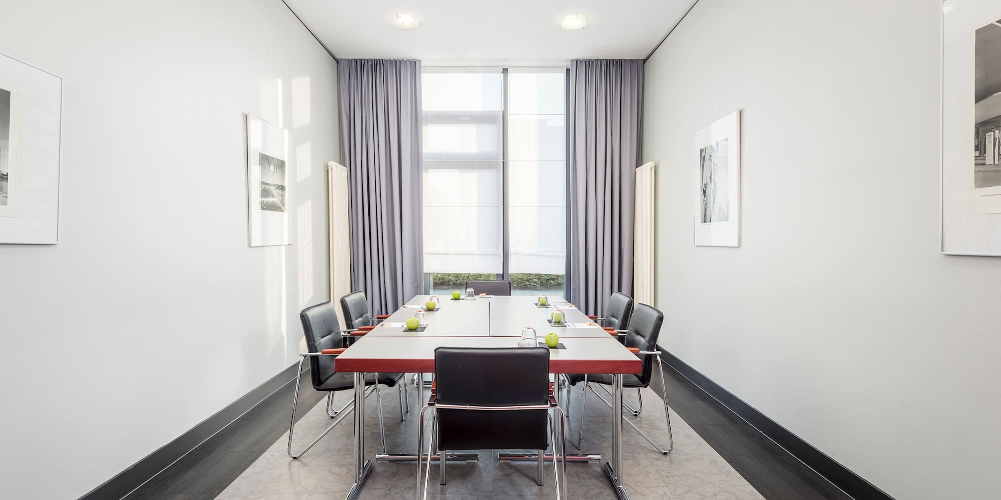 a room with a table and chairs