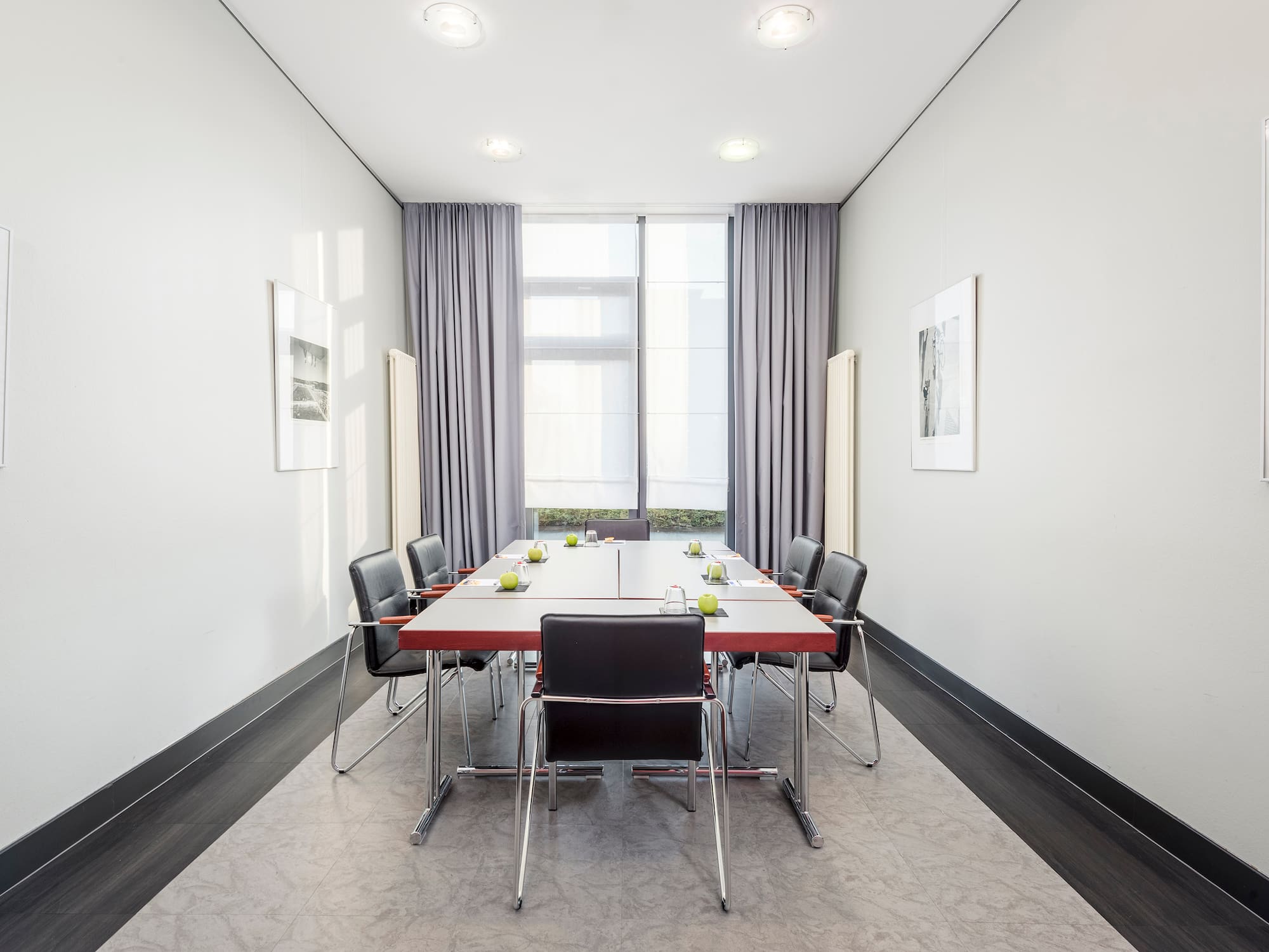 a room with a table and chairs