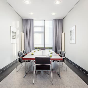 a room with a table and chairs