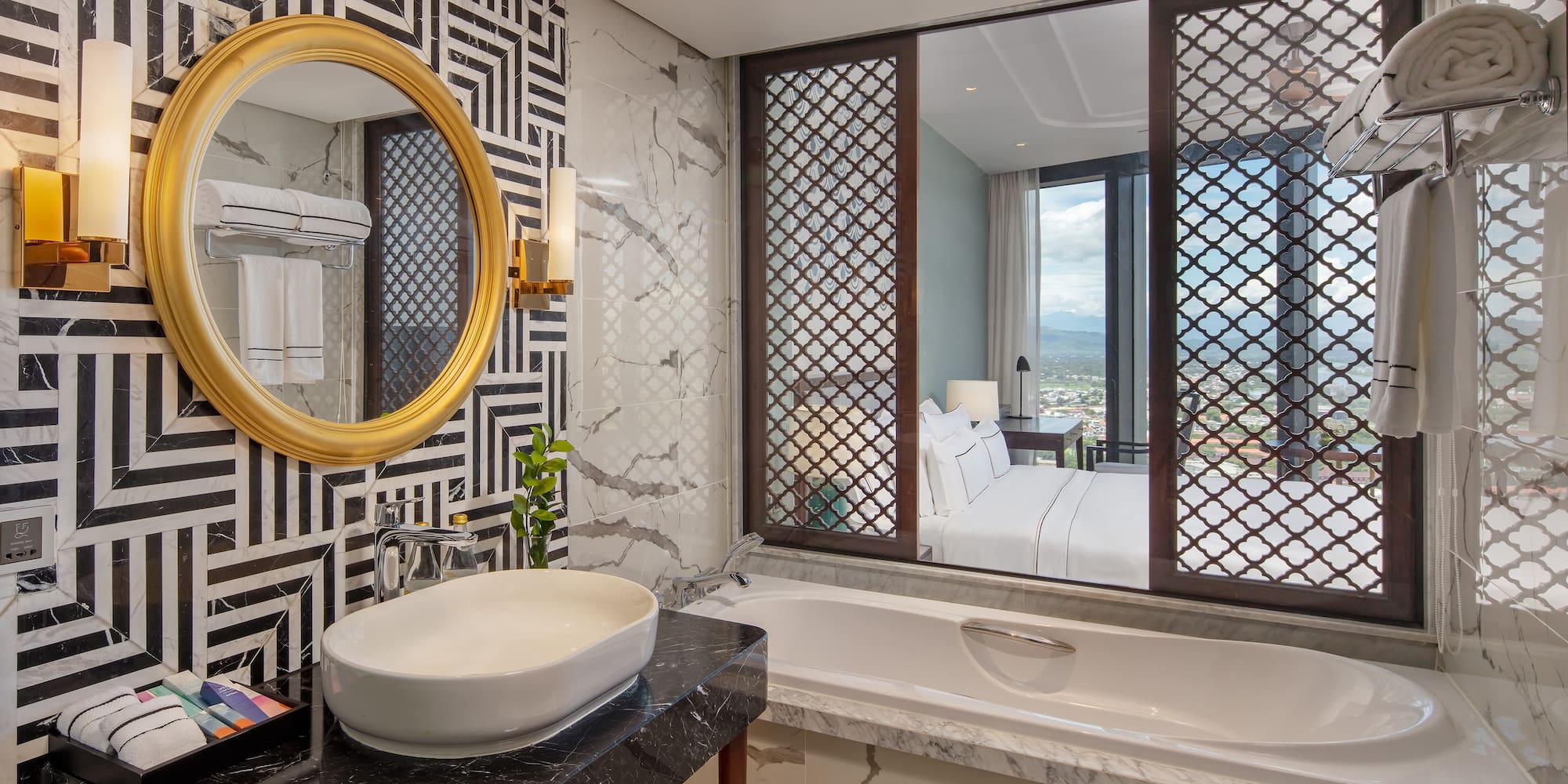 a bathroom with a mirror and a bathtub