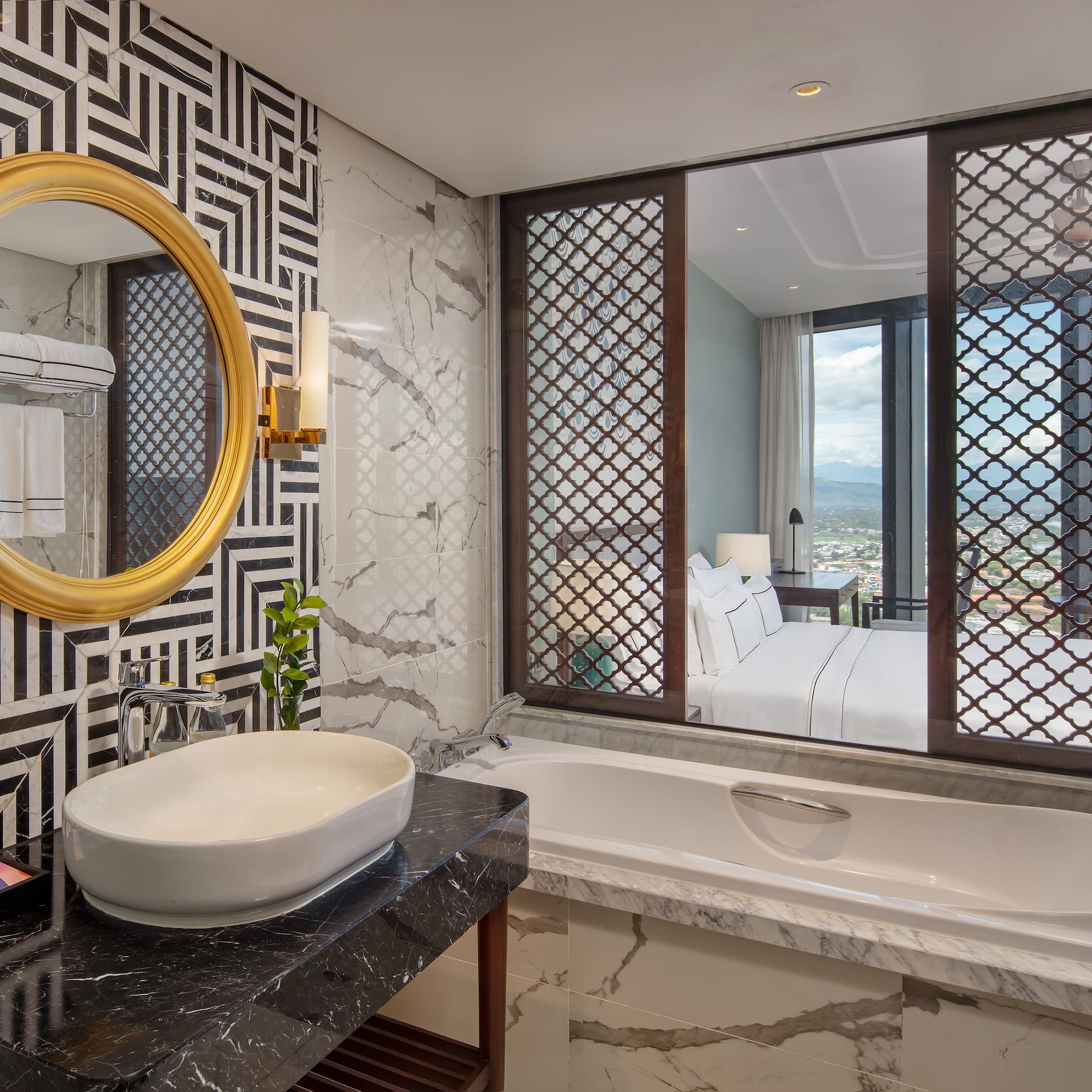 a bathroom with a mirror and a bathtub