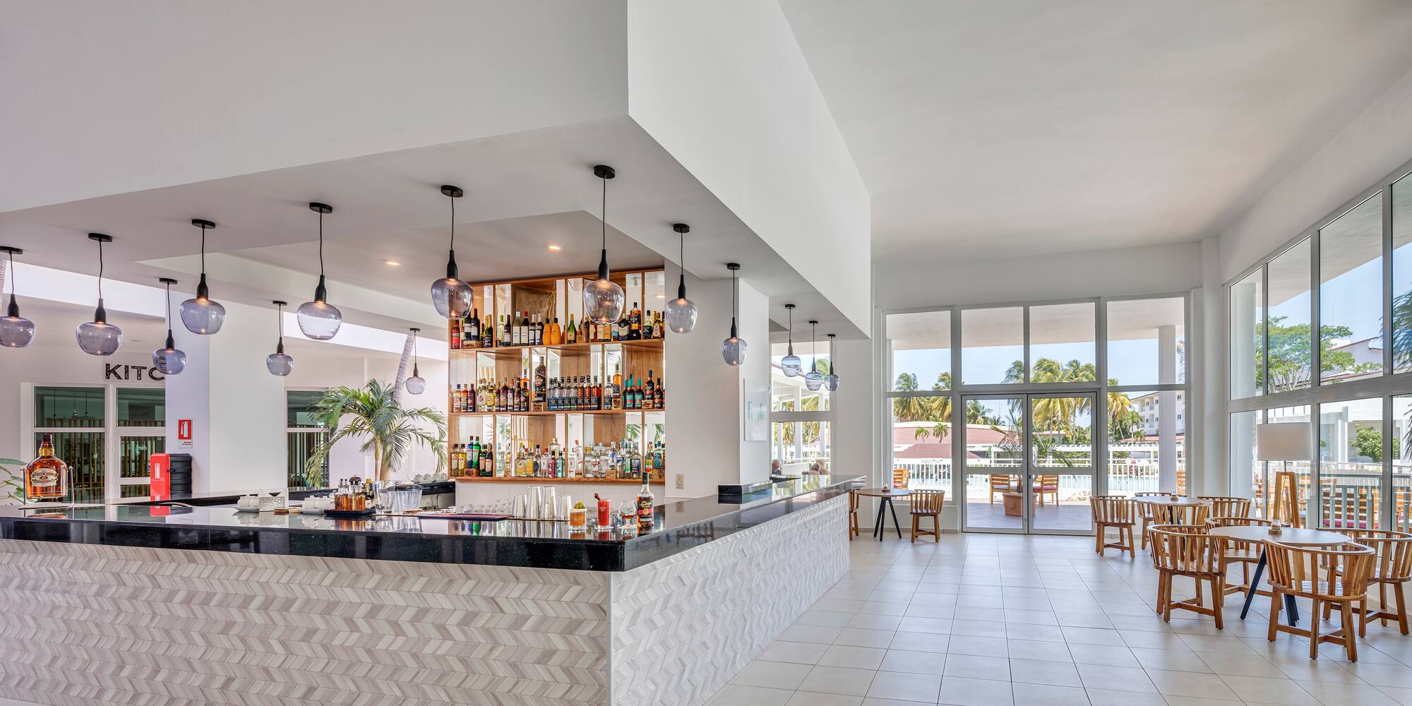a bar with bottles on the counter