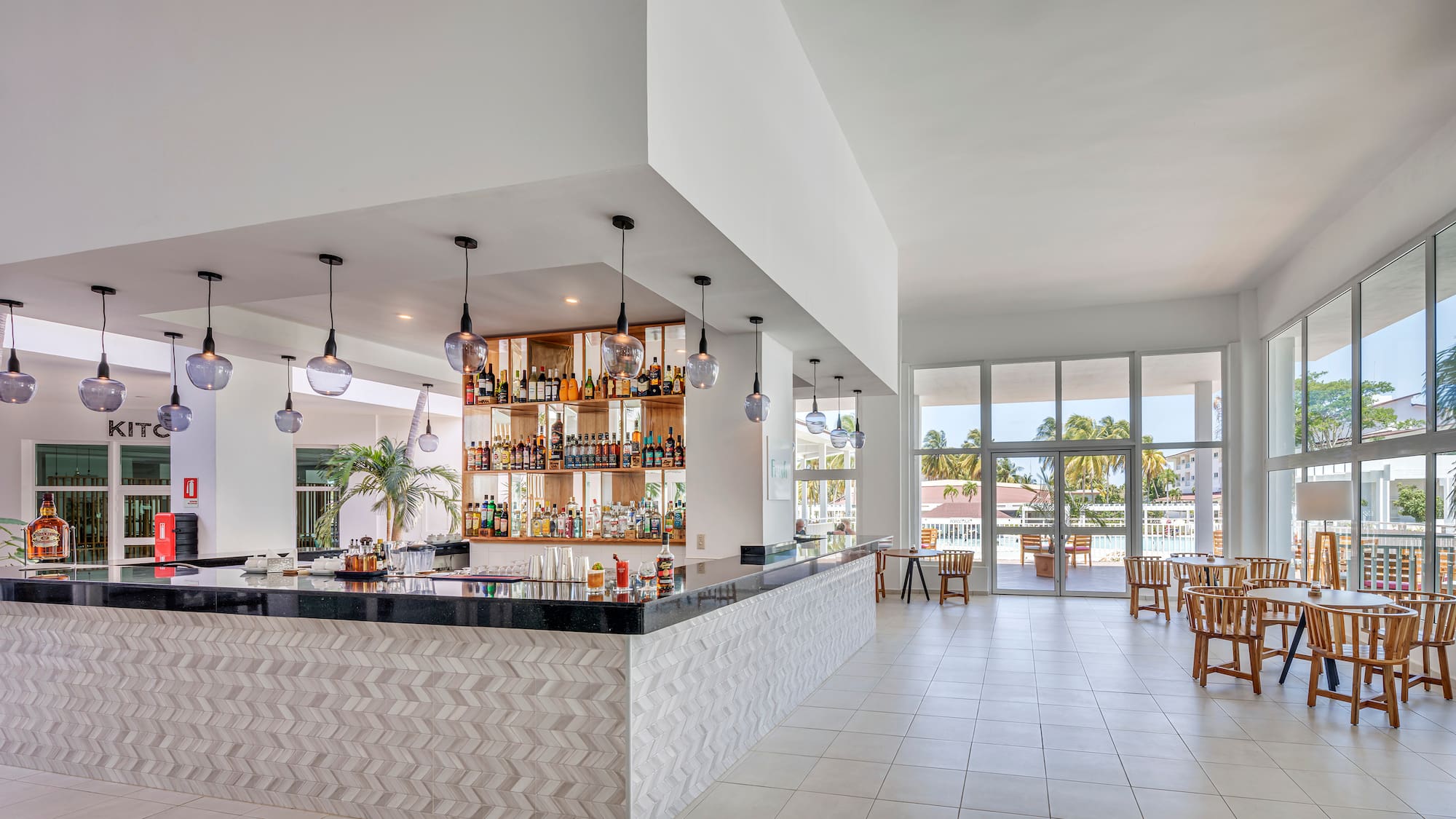 a bar with bottles on the counter