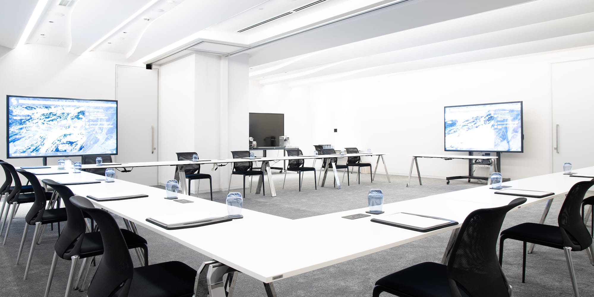 a room with tables and chairs