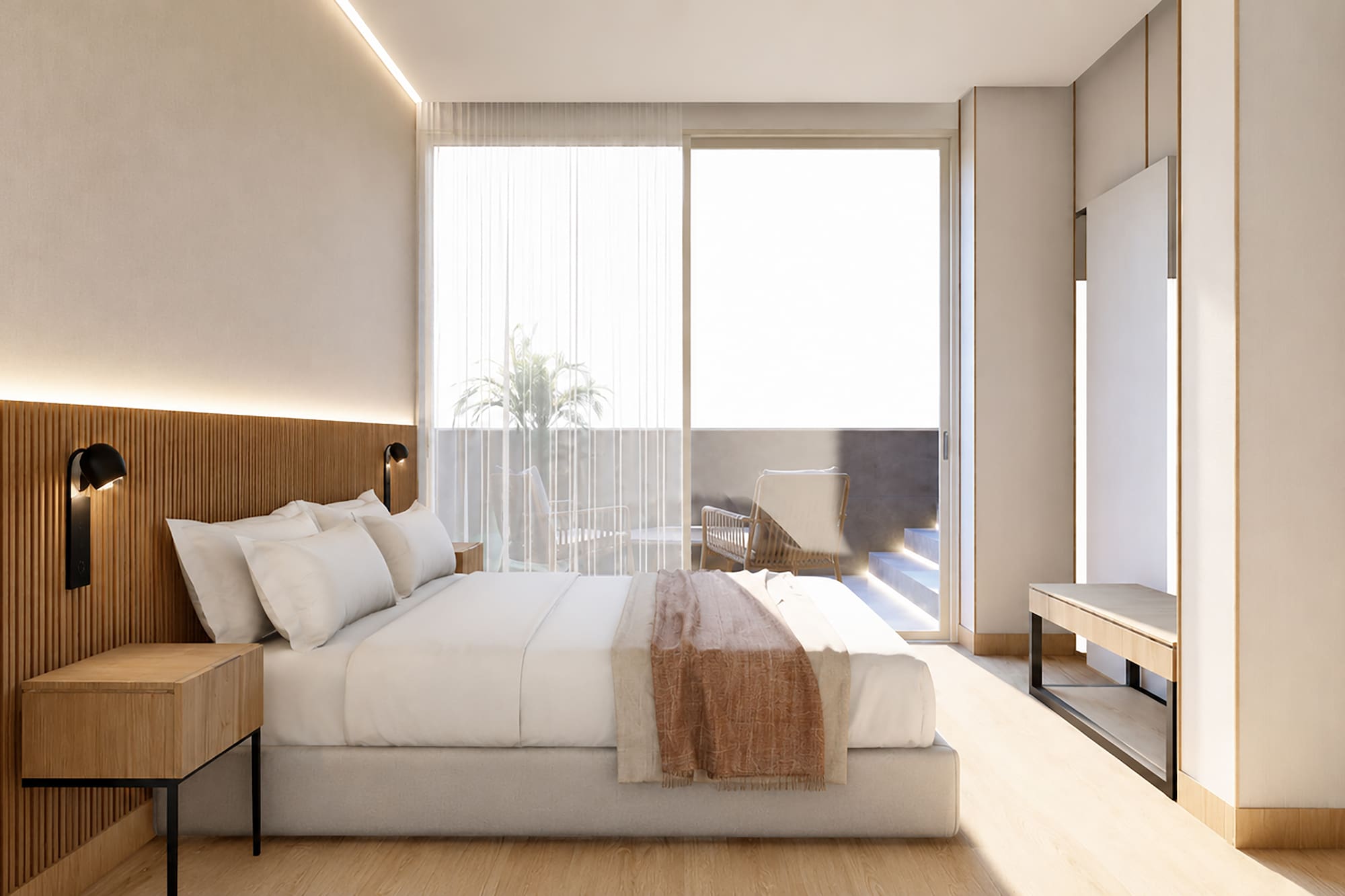 Contemporary hotel room with wooden headboard, large bed, and private balcony.