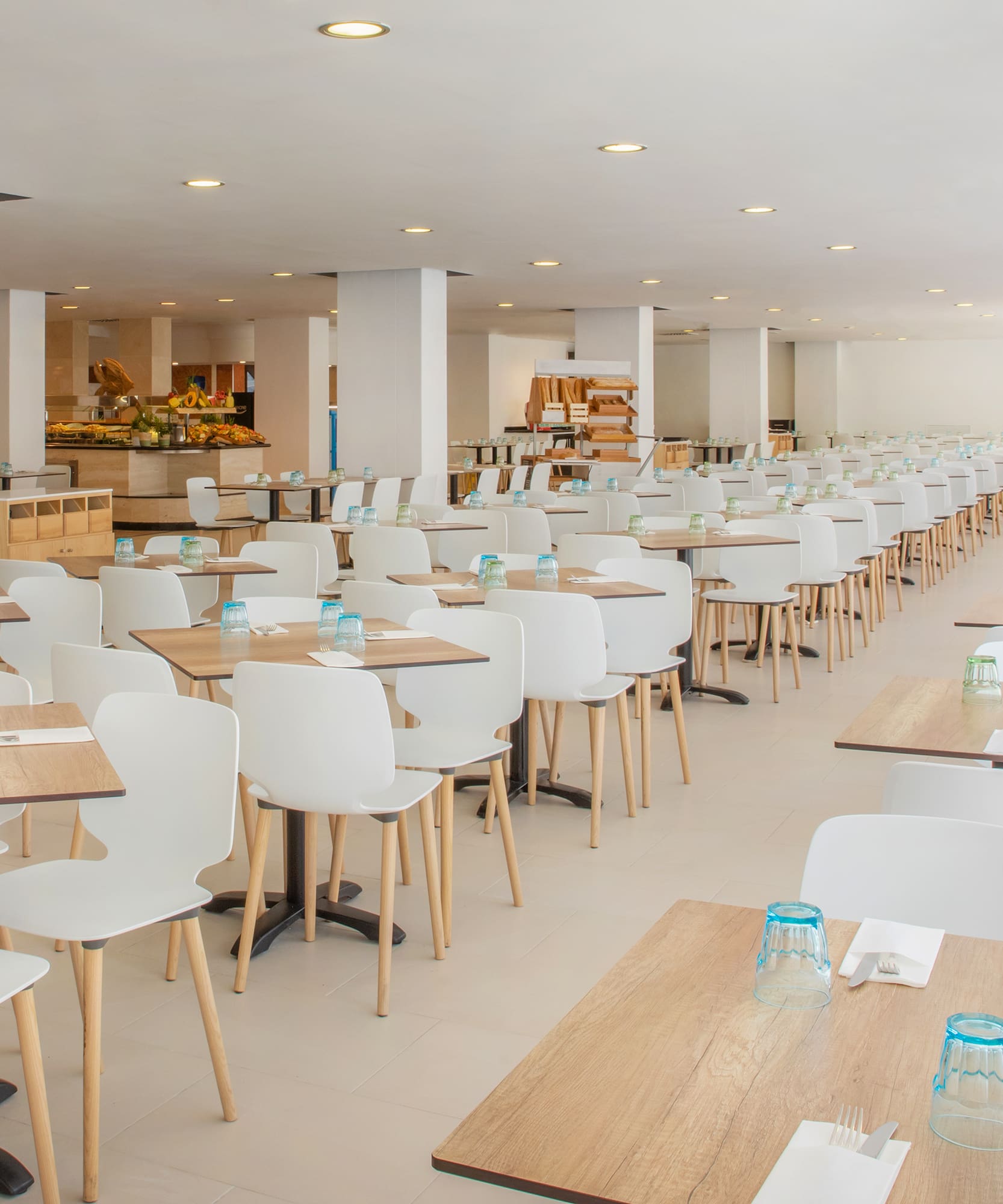 a large room with tables and chairs