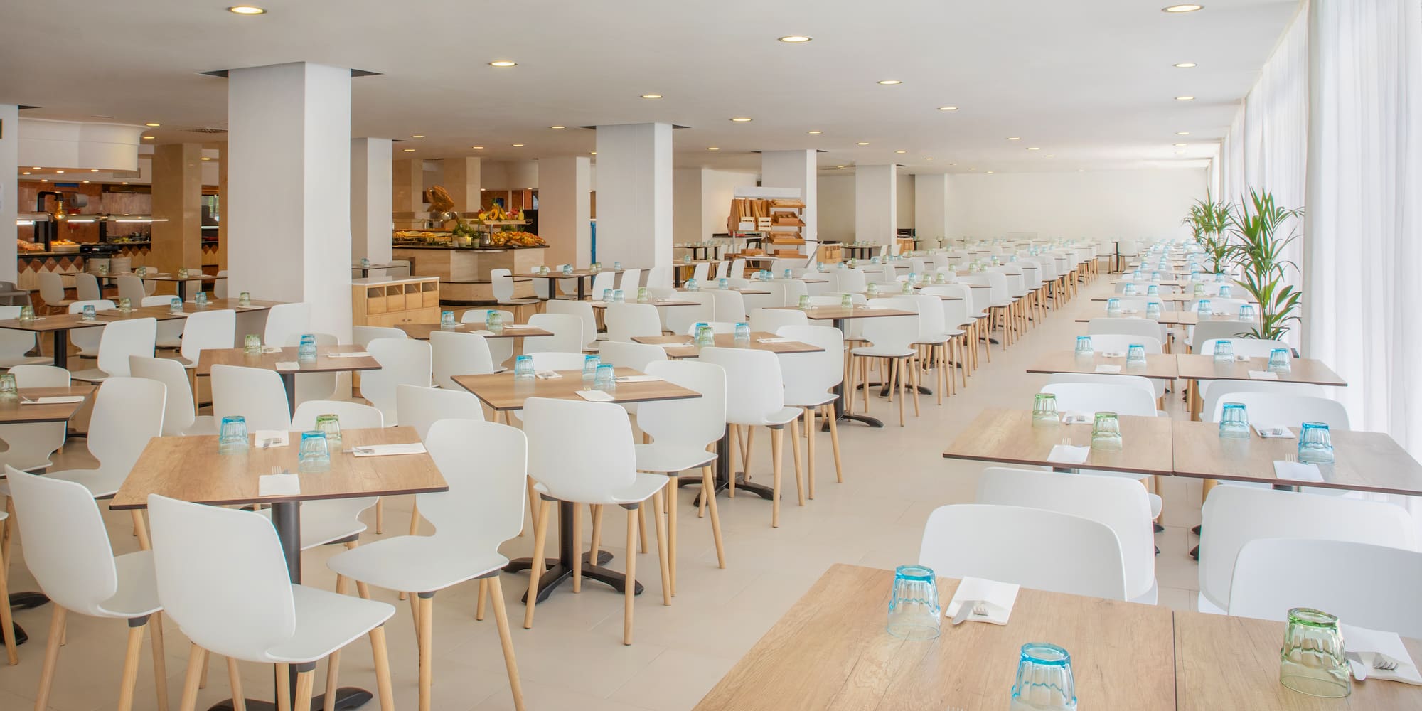 a large room with tables and chairs