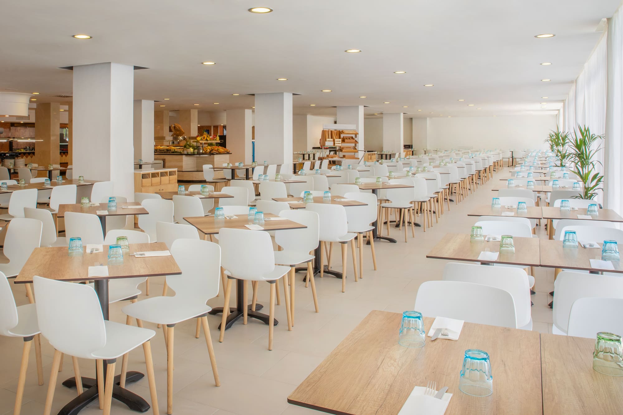 a large room with tables and chairs