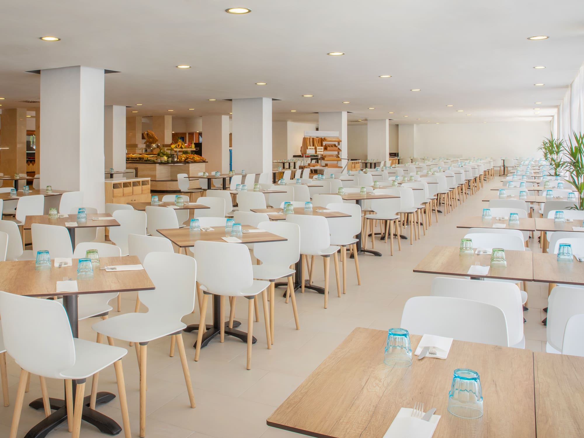a large room with tables and chairs