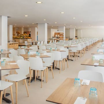 a large room with tables and chairs