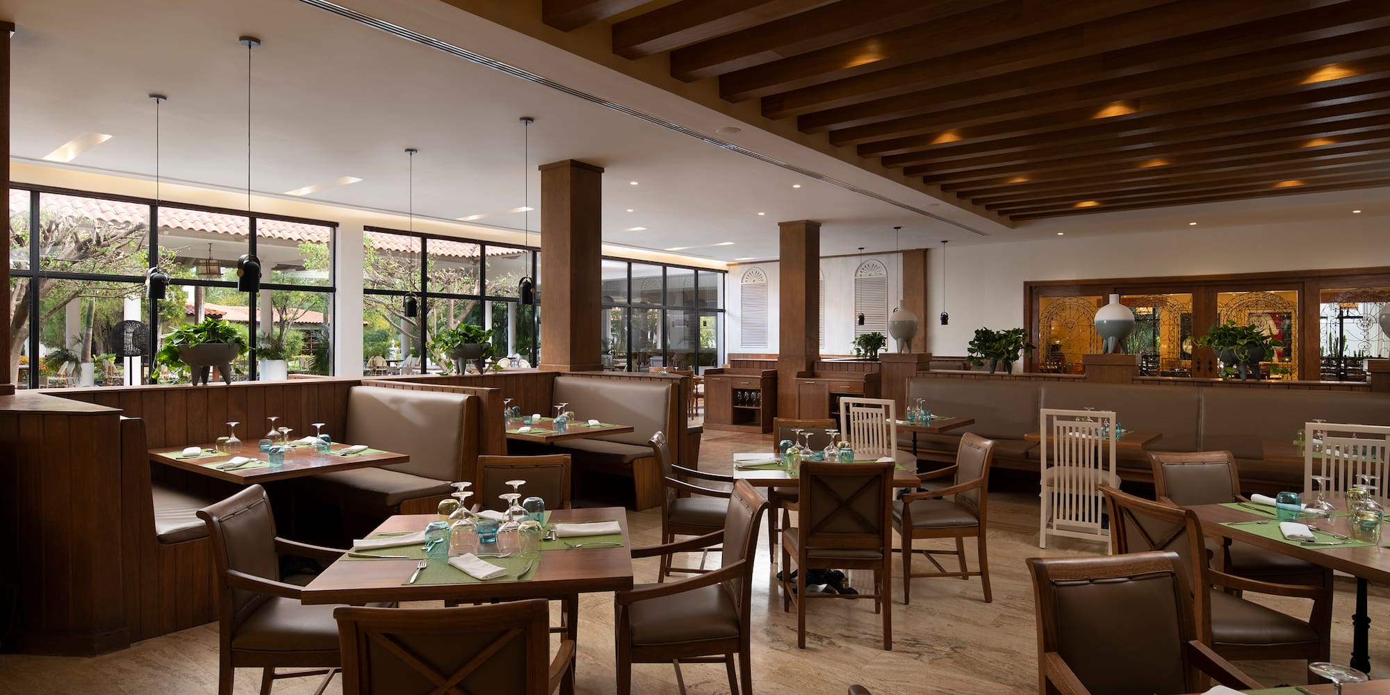 a restaurant with tables and chairs