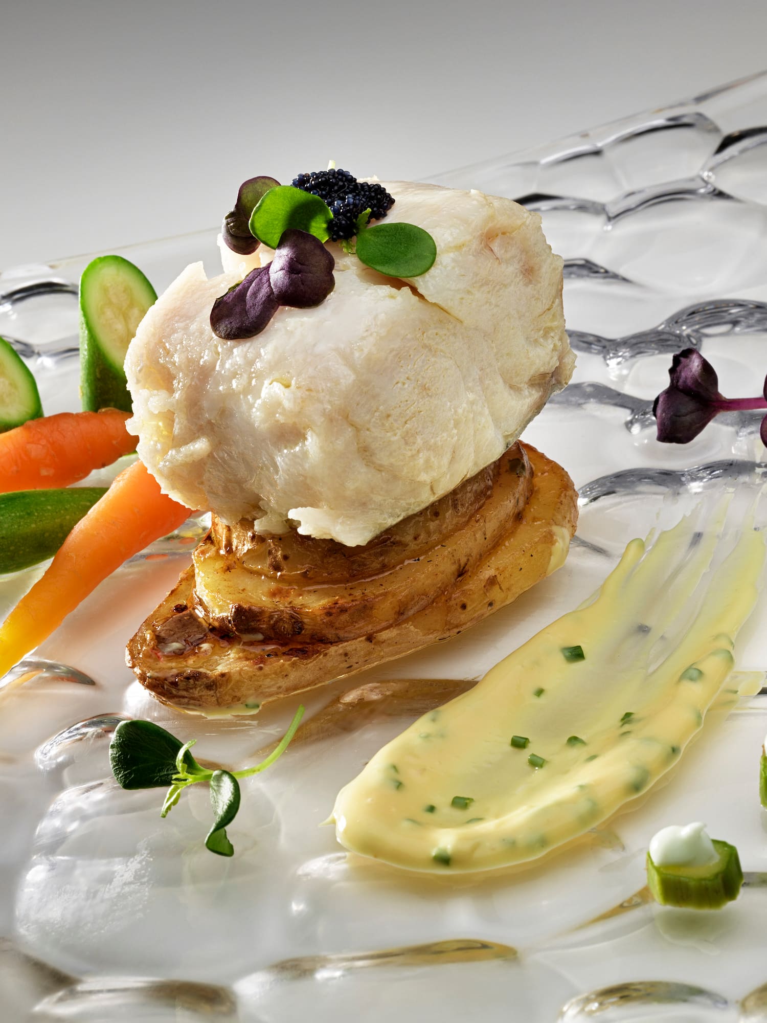 a plate of food on a white surface