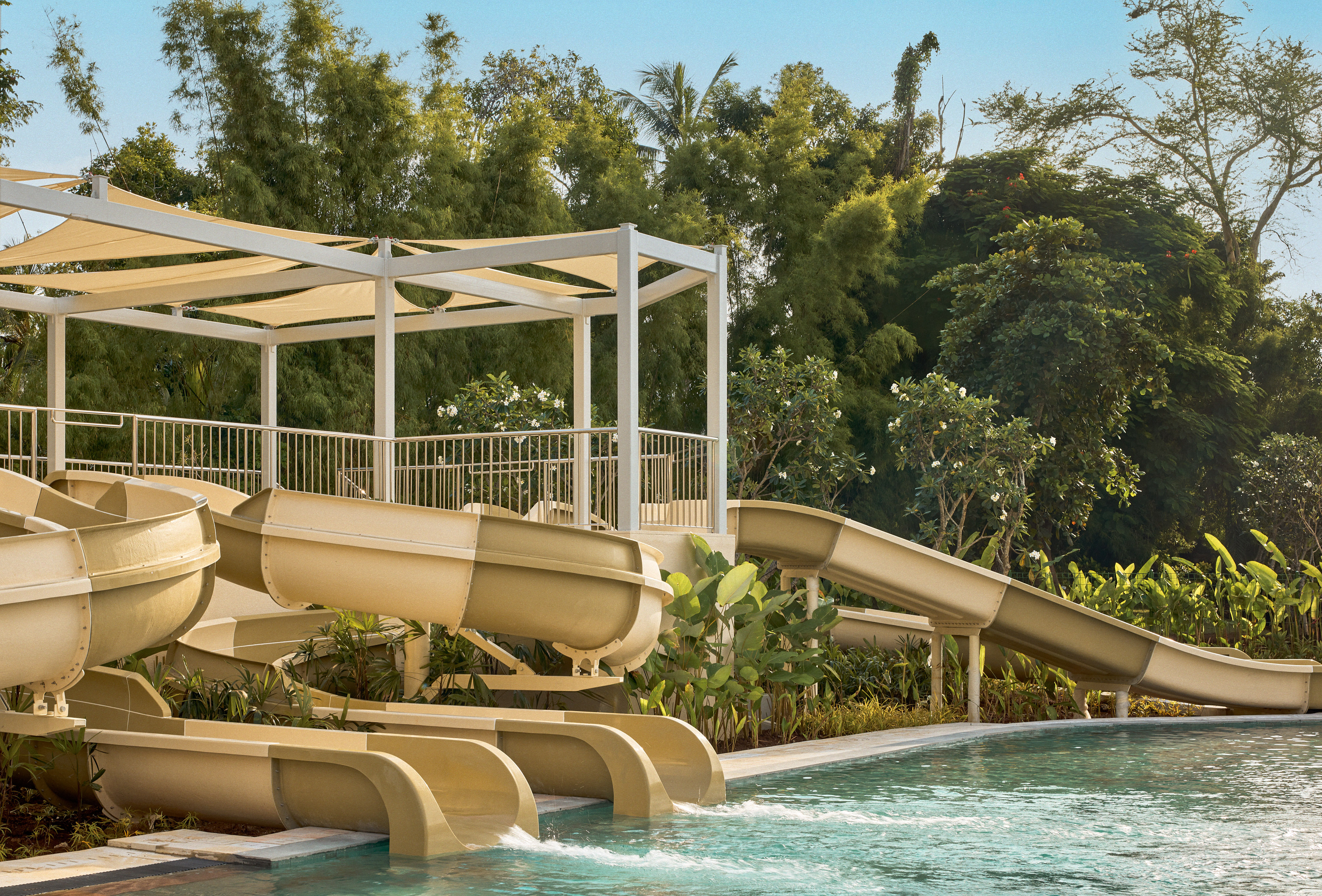 a water slide in a pool